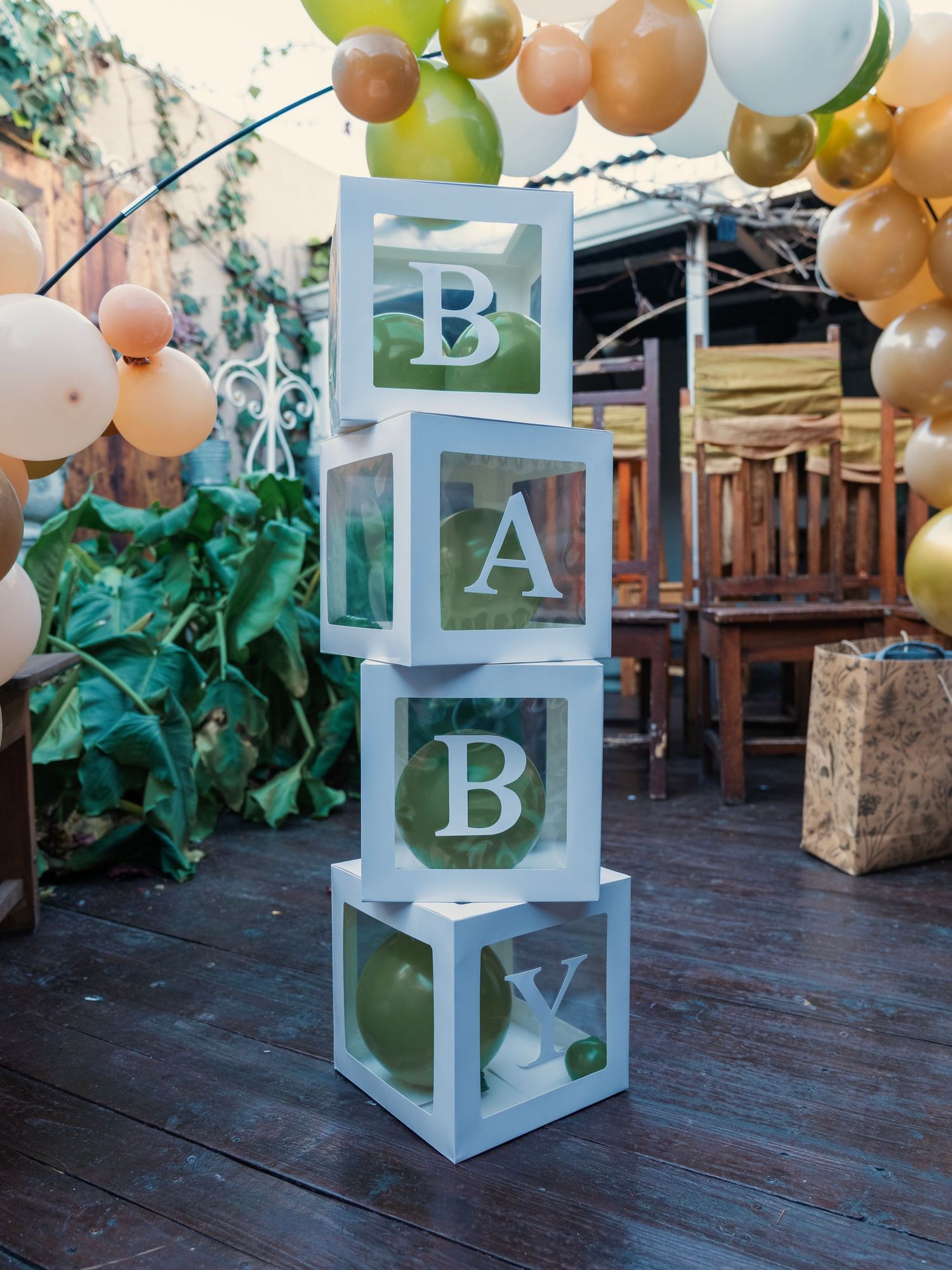 White transparent BABY blocks with balloons at outdoor baby shower decoration. Babyshower Photoshoot