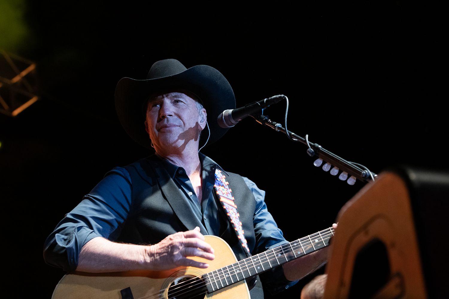 Kevin Costner performing. Corporate event, conference, incentives, galas, and non-profit event photography in Denver, Colorado.