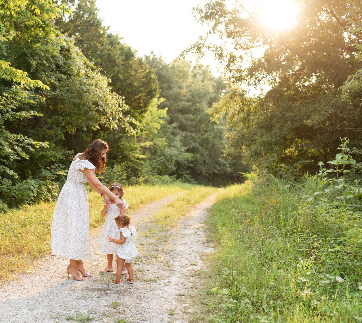 st louis family playing during family photo session in ofallon mo