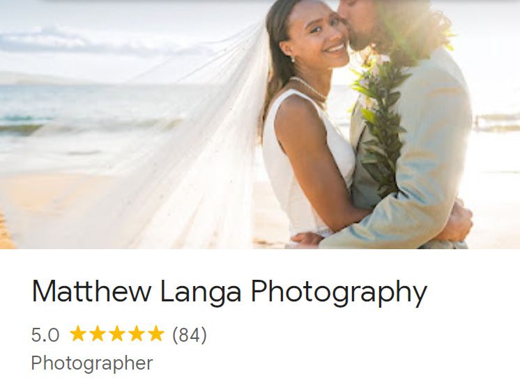 Matthew Langa Photography 5-star rated wedding photographer capturing romantic beach ceremony couple embracing in Hawaii.