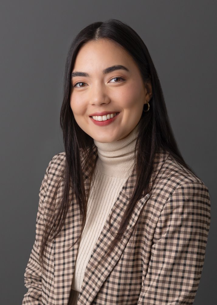 Professional portrait series showing person in cream turtleneck and brown plaid blazer against gray background.