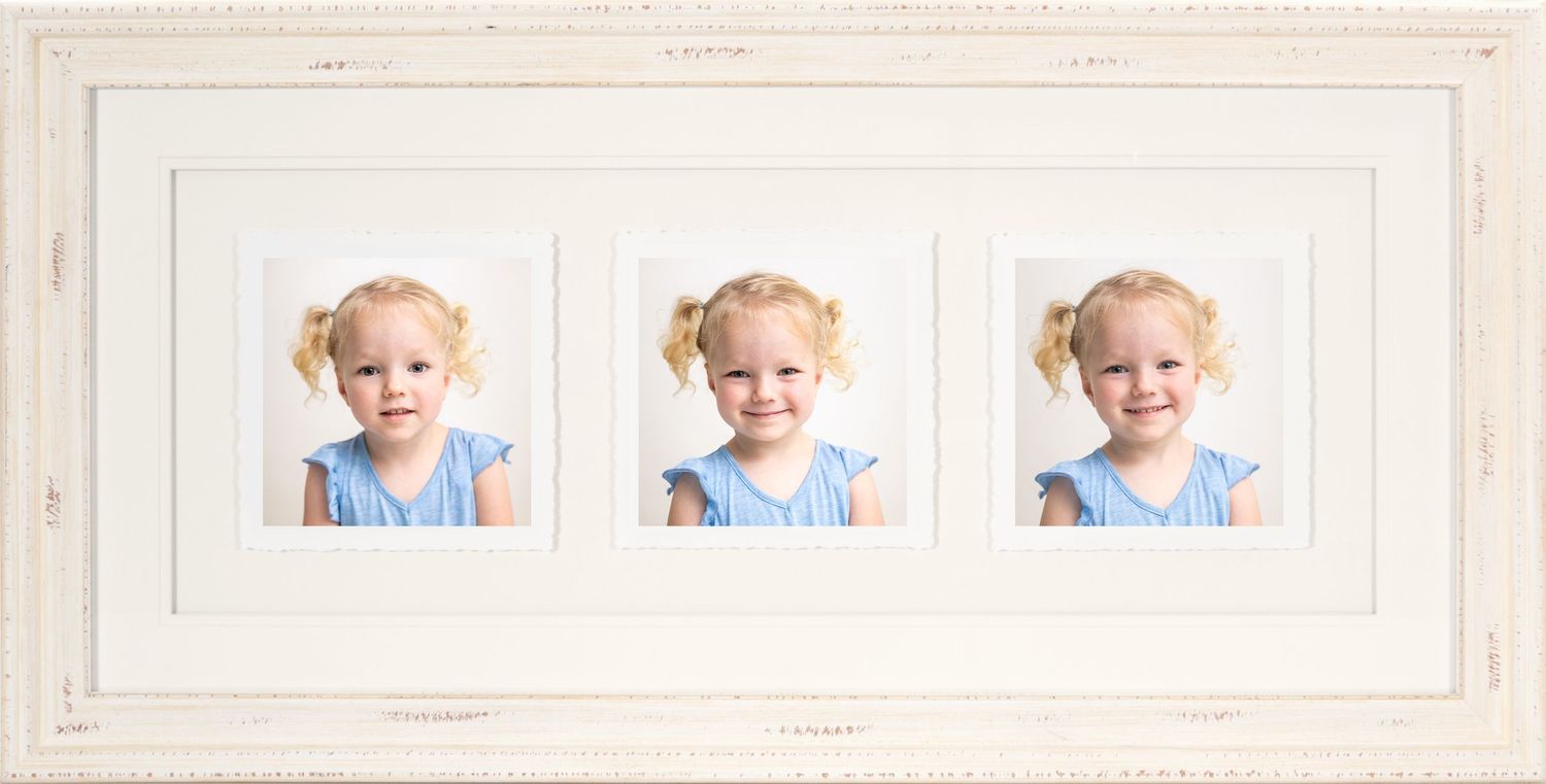Triple portrait frame showing child in blue dress against white background with different facial expressions.