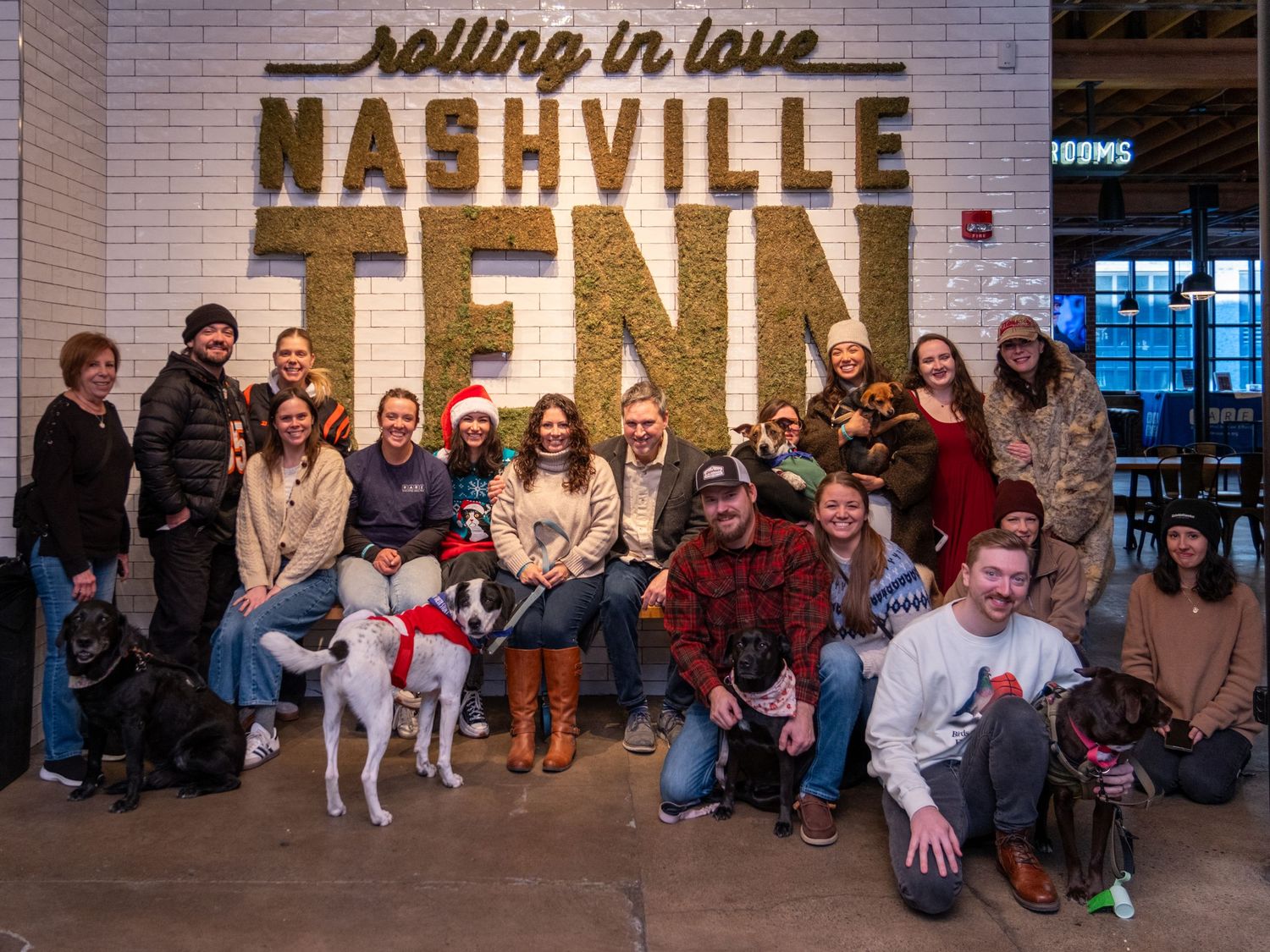 Event photograph from a holiday party benefitting an animal rescue organization.
