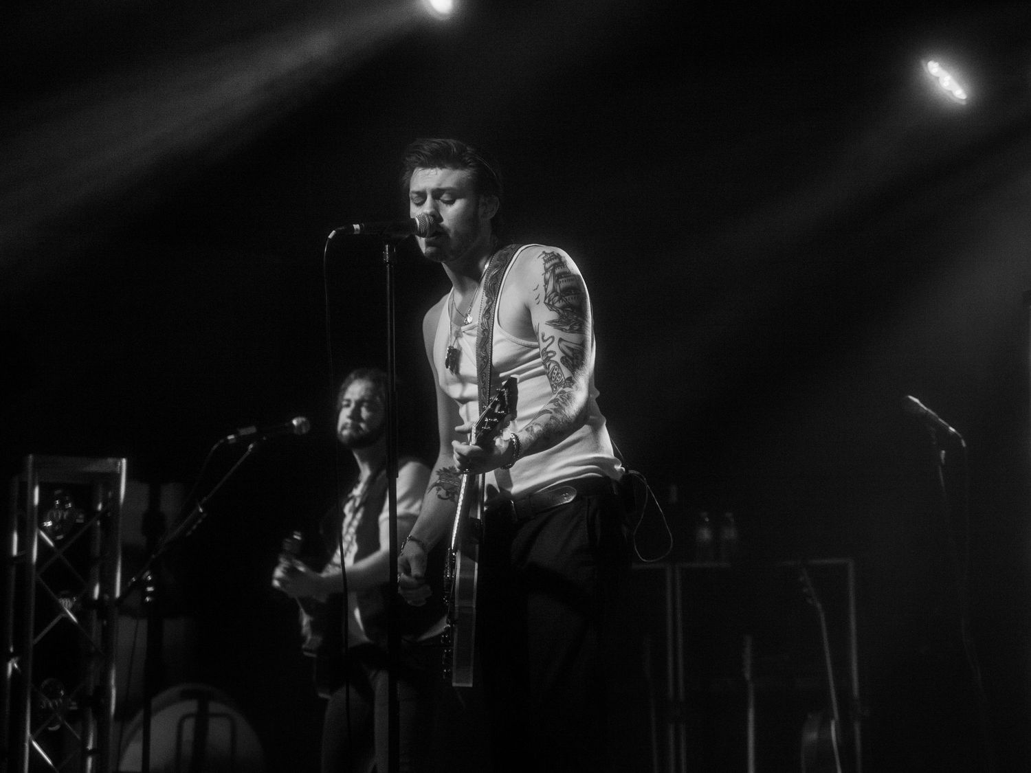 Black and white photograph of a live music performance.