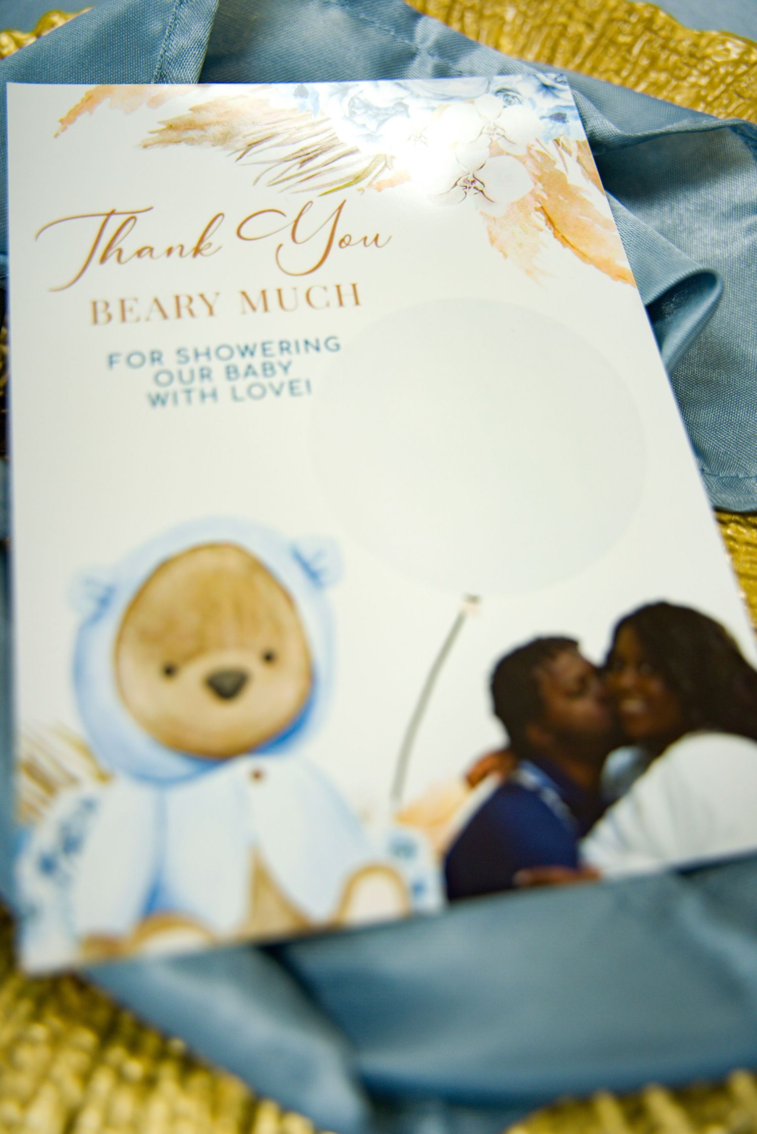Baby shower thank you card reading Thank You Beary Much for Showering Our Baby with Love featuring a teddy bear.
