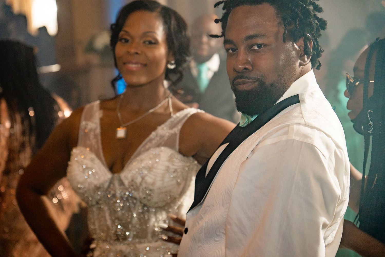 Bride and groom share a romantic moment together on the dance floor.
