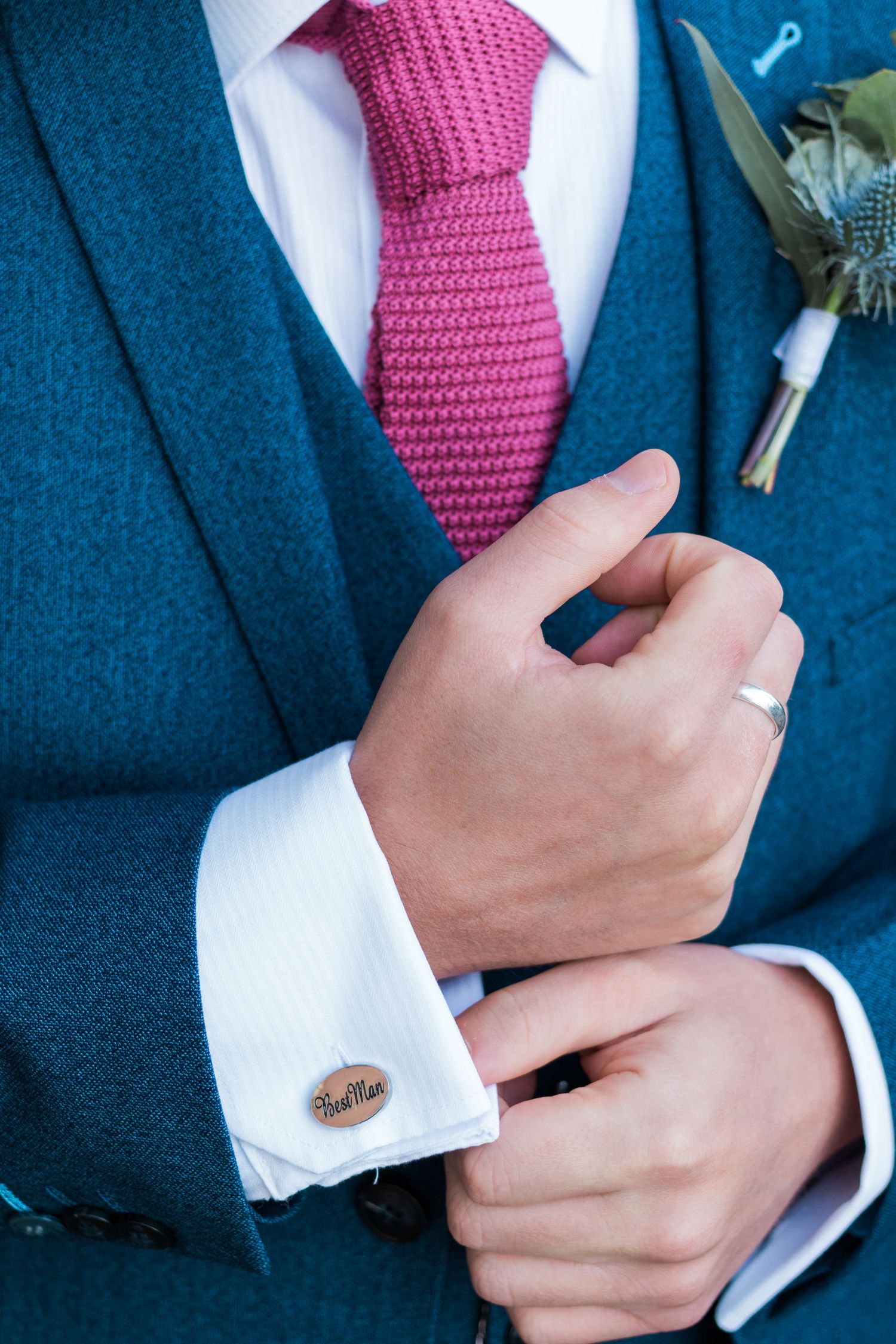 Groom adjusts cufflinks at Baltic Newcastle wedding venue, stylish suit detail capturing modern North East UK wedding photography