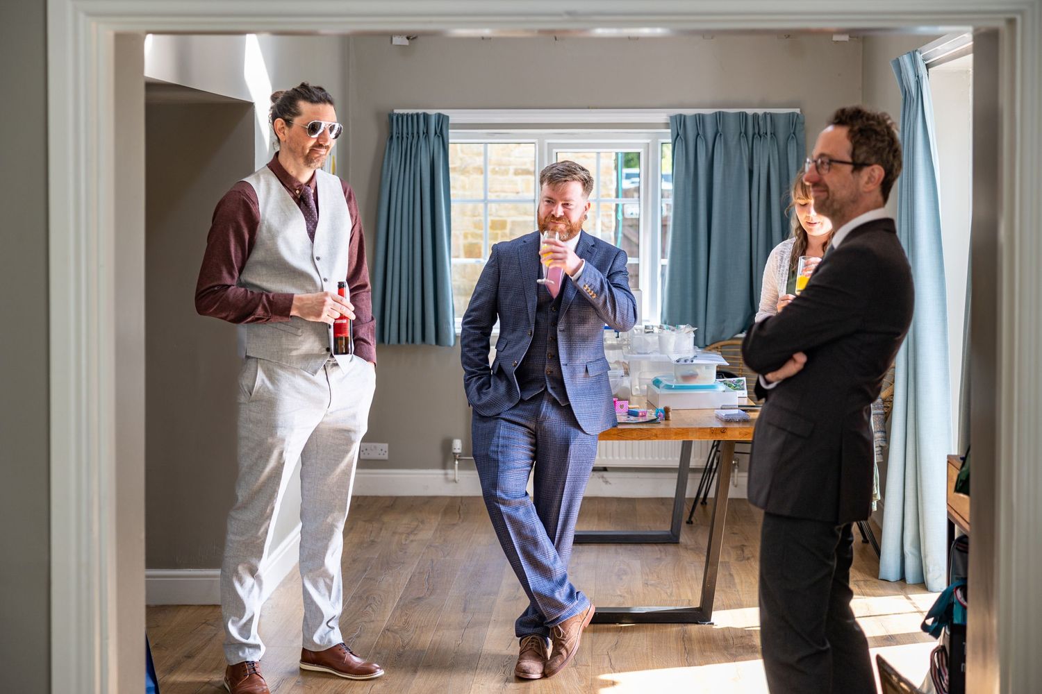 Groom and groomsmen relax at Black Horse Beamish, candid wedding morning prep in North East UK venue with natural light and stylish suits
