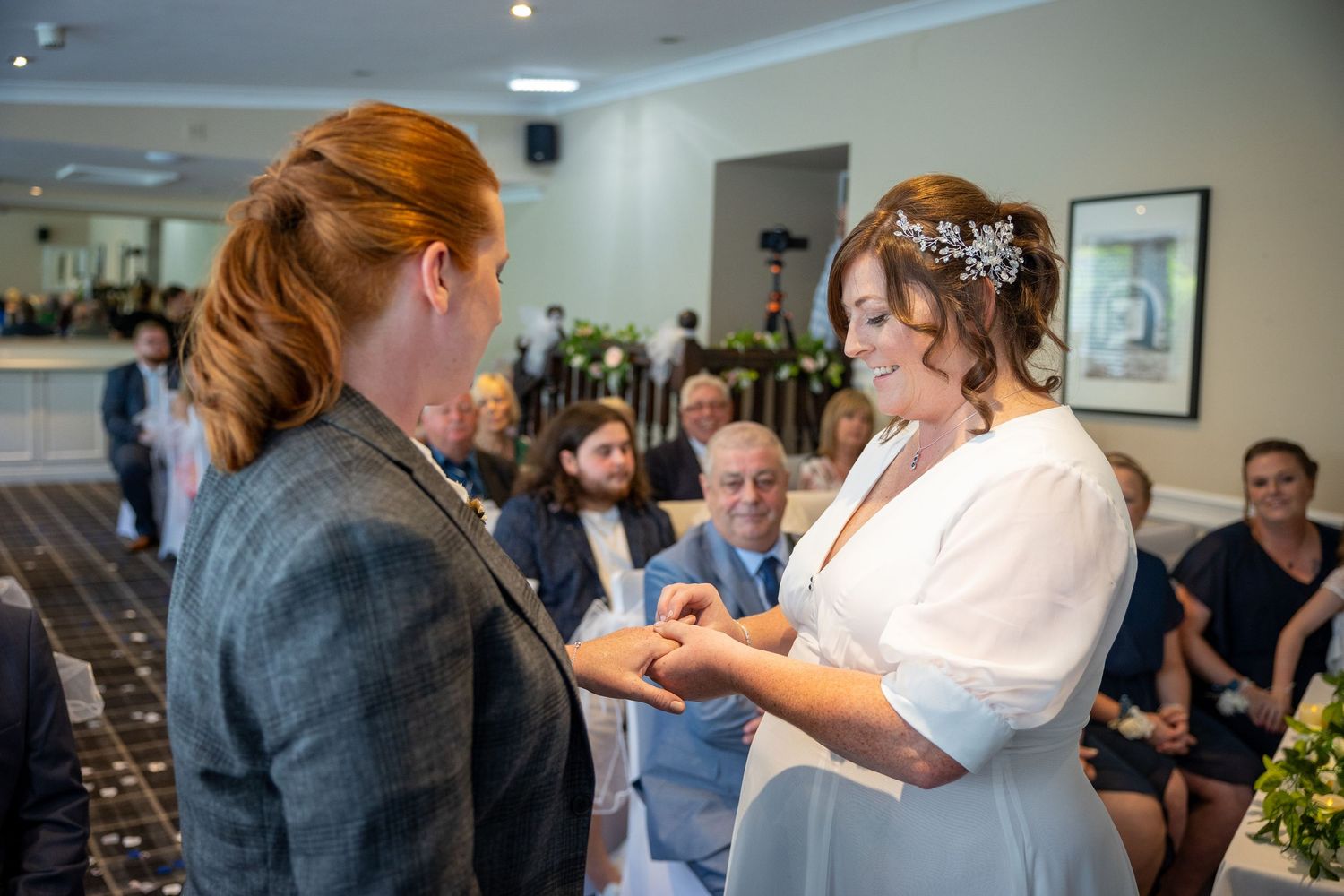Same sex couple exchange rings at Angel View Hotel, beautiful North East UK wedding venue with intimate ceremony and inclusive atmosphere