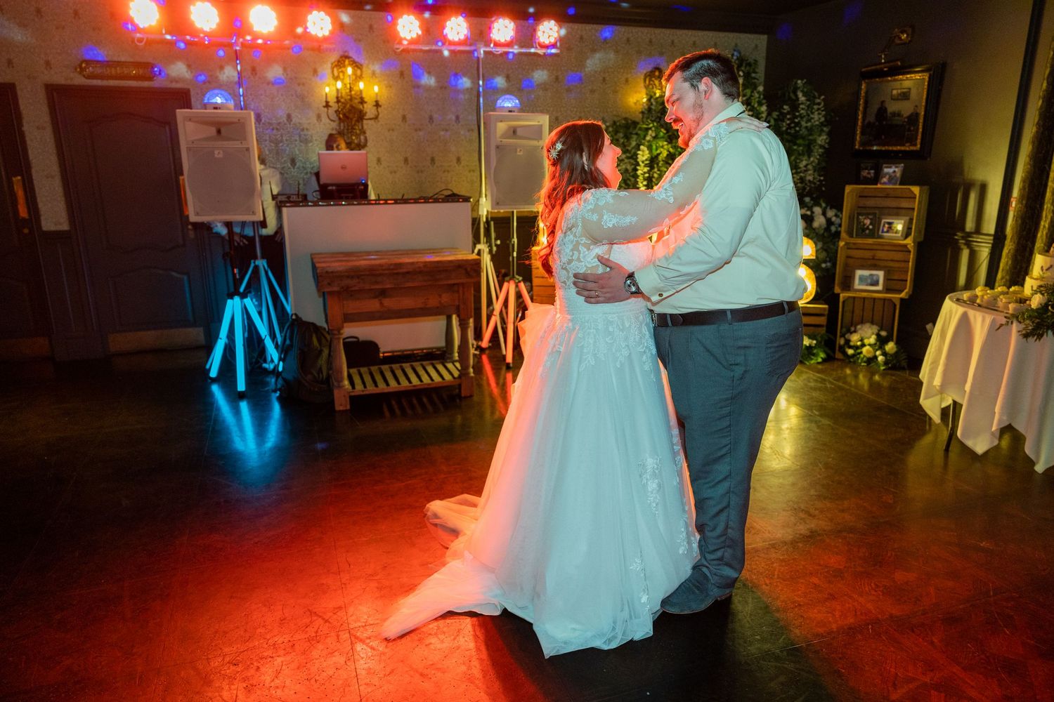 First dance at Bowburn Hall; couple share a romantic moment under warm lights on the dance floor.