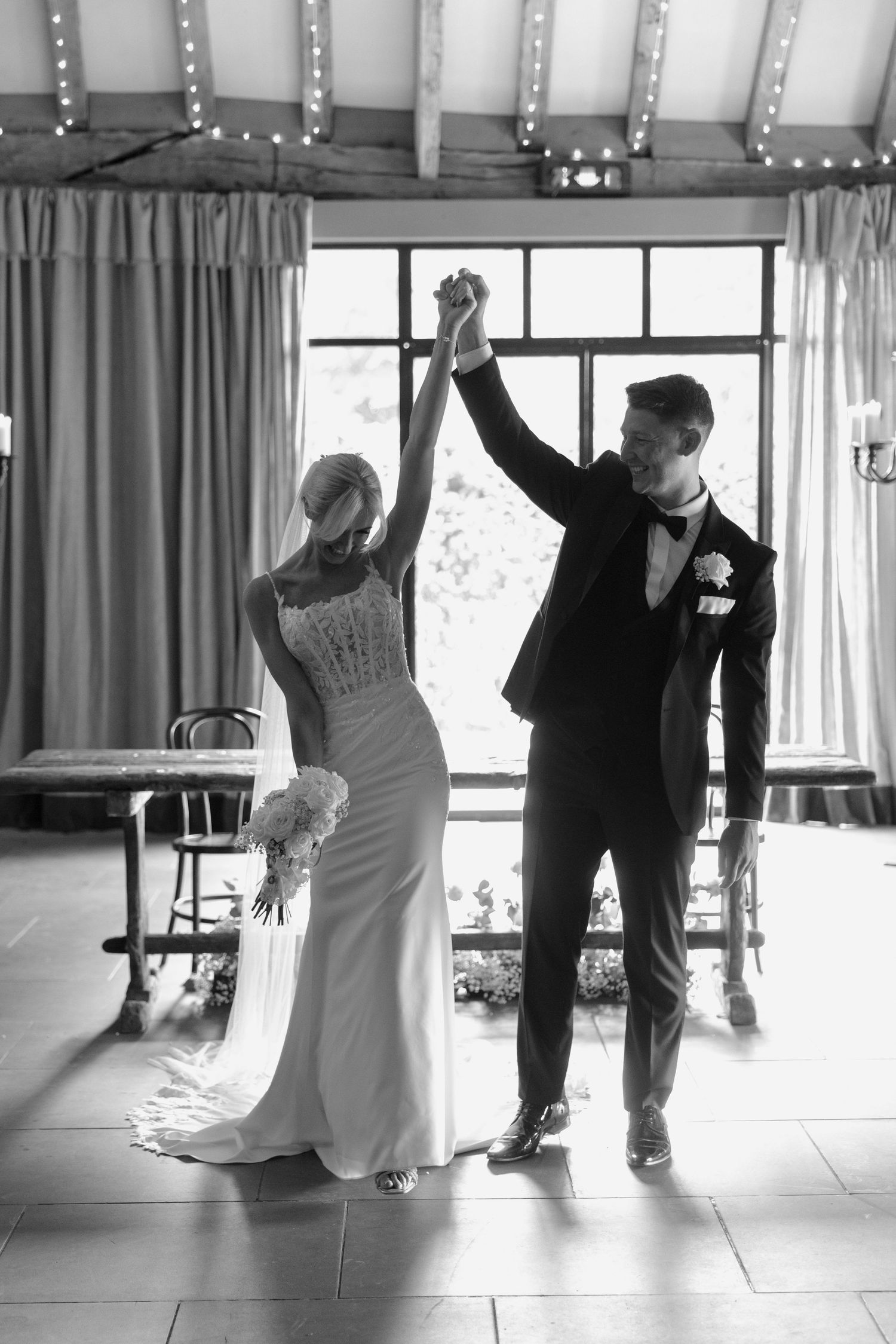 Black and white photos of wedding dance moves in an indoor venue.