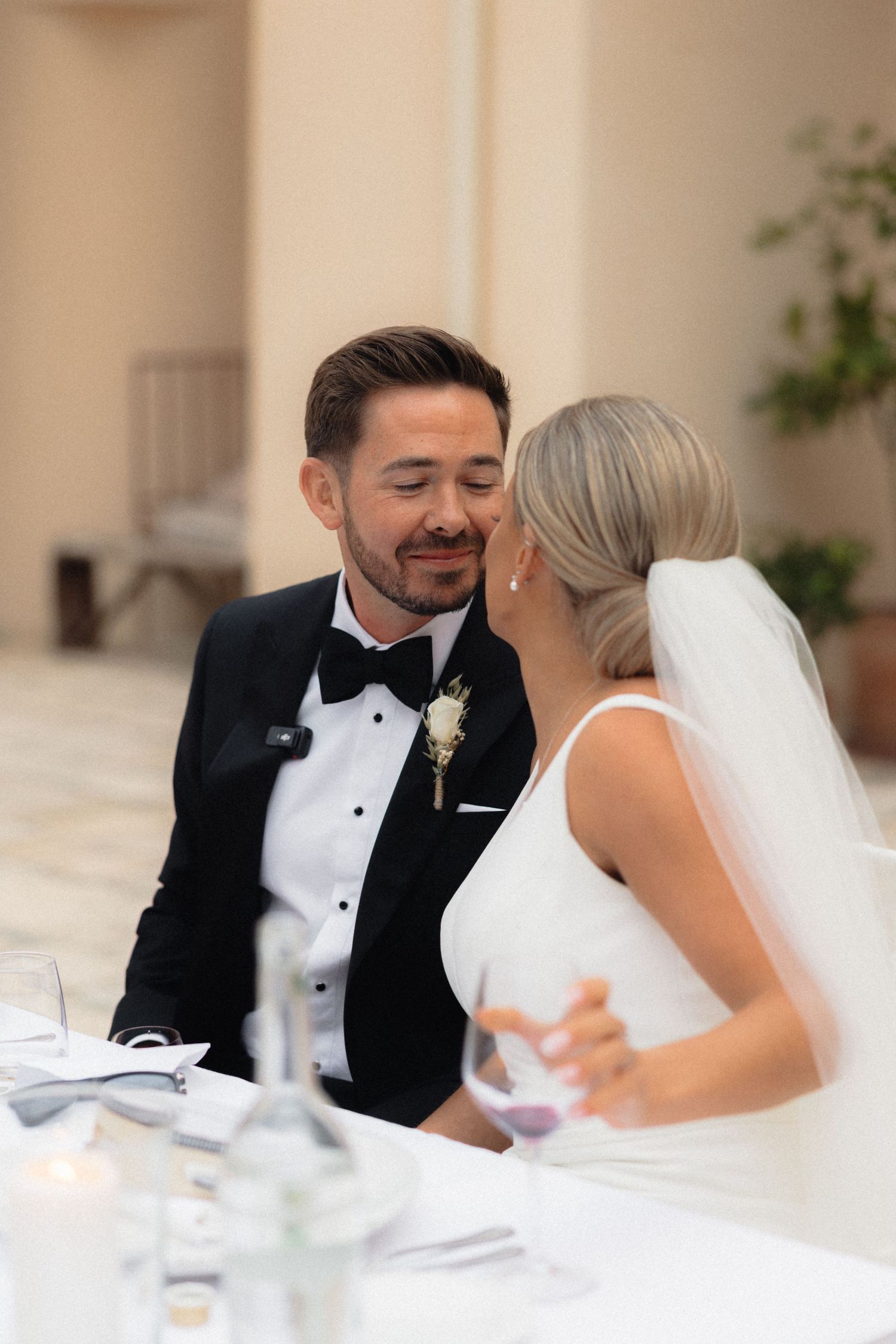 Candid reactions captured during emotional wedding reception speeches.