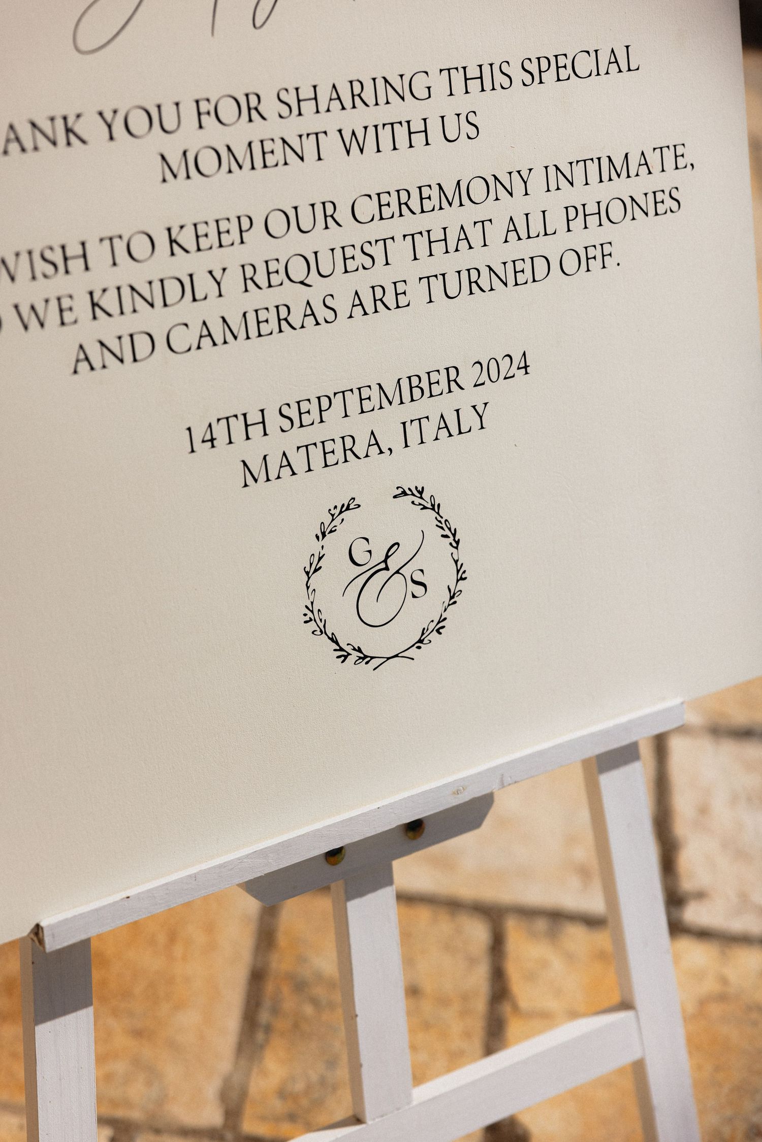 Wedding sign displaying ceremony details for September 2024 in Matera, Italy.