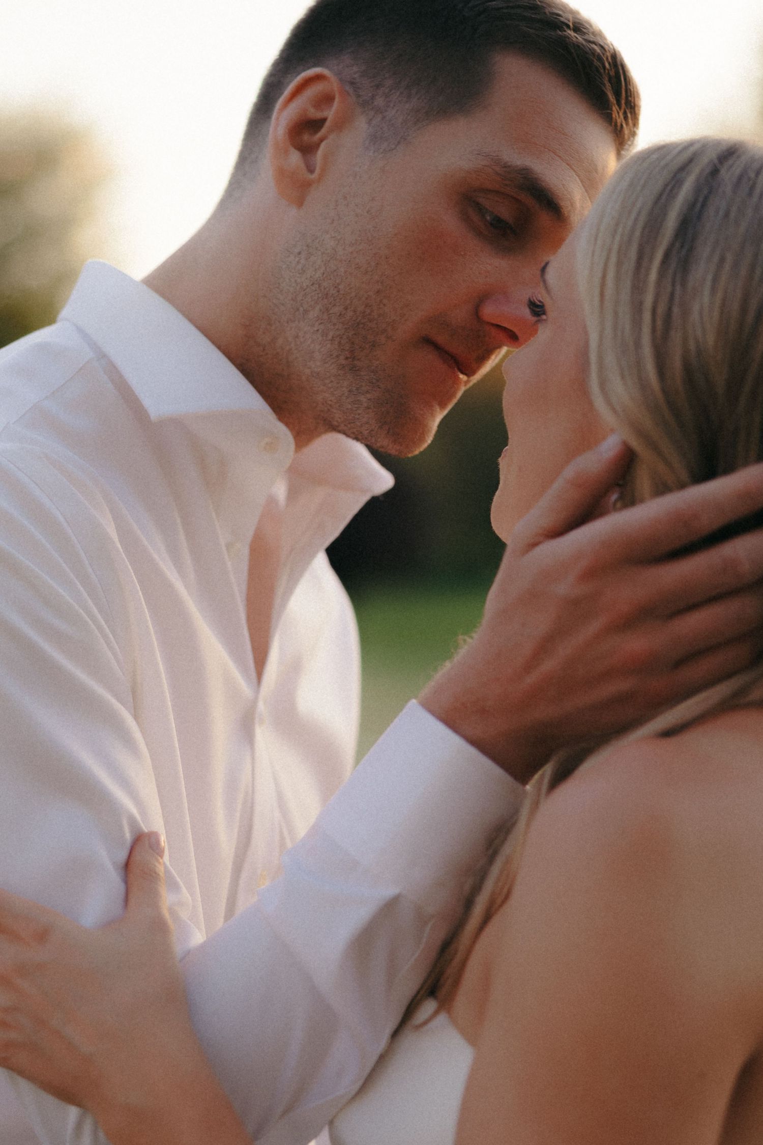 Romantic sequence of tender moments between newlyweds in white wedding attire.