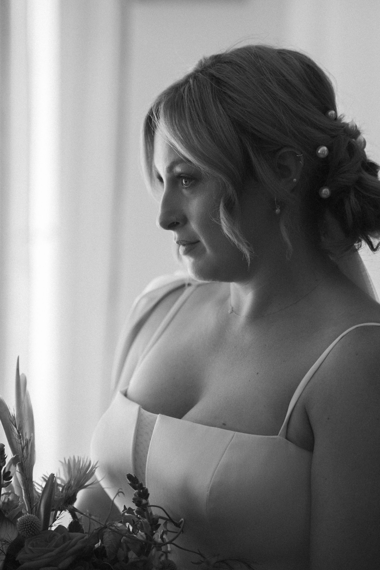 Black and white silhouettes of wedding party members in preparation.