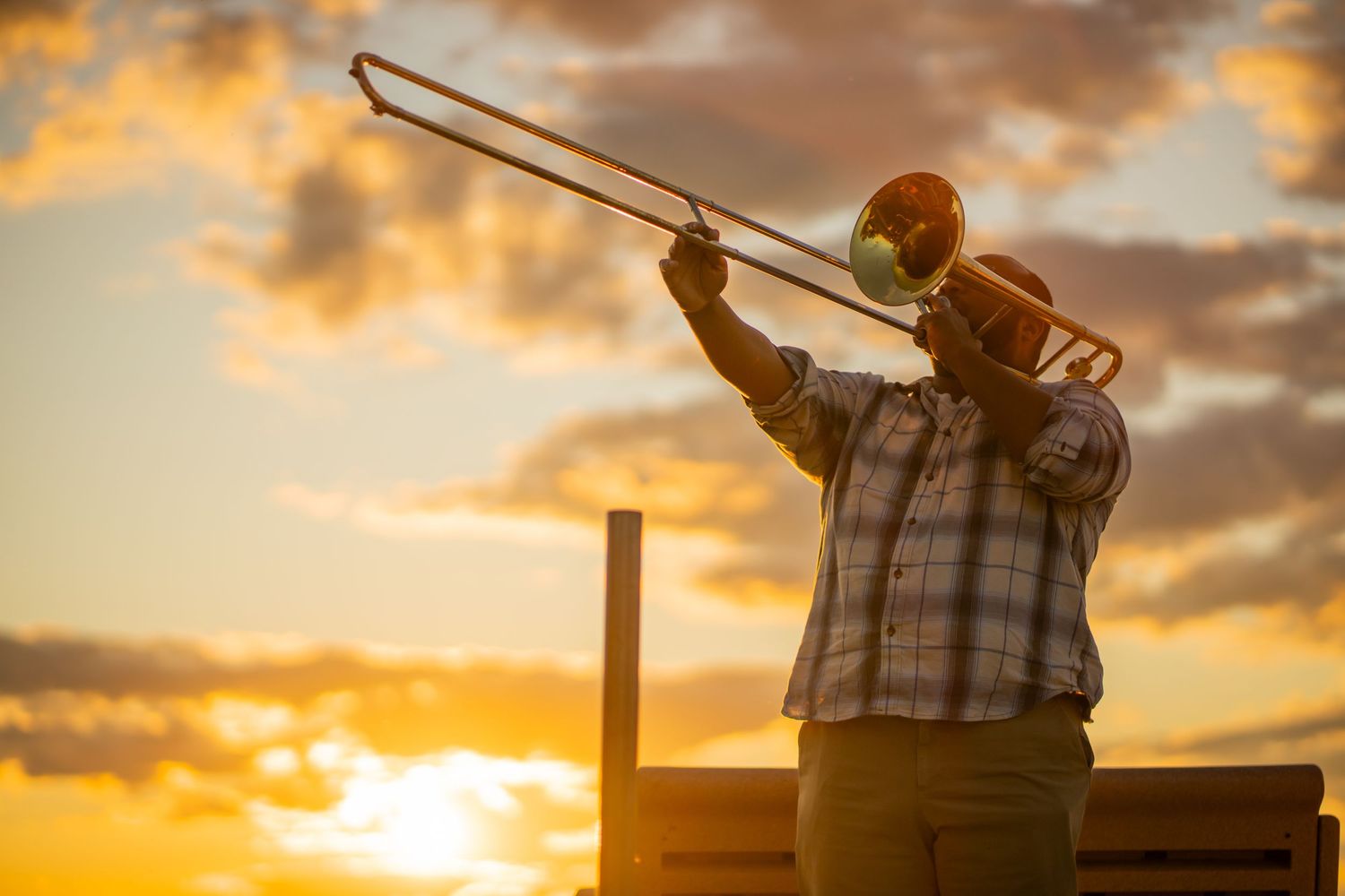 Silhouette trombone player.