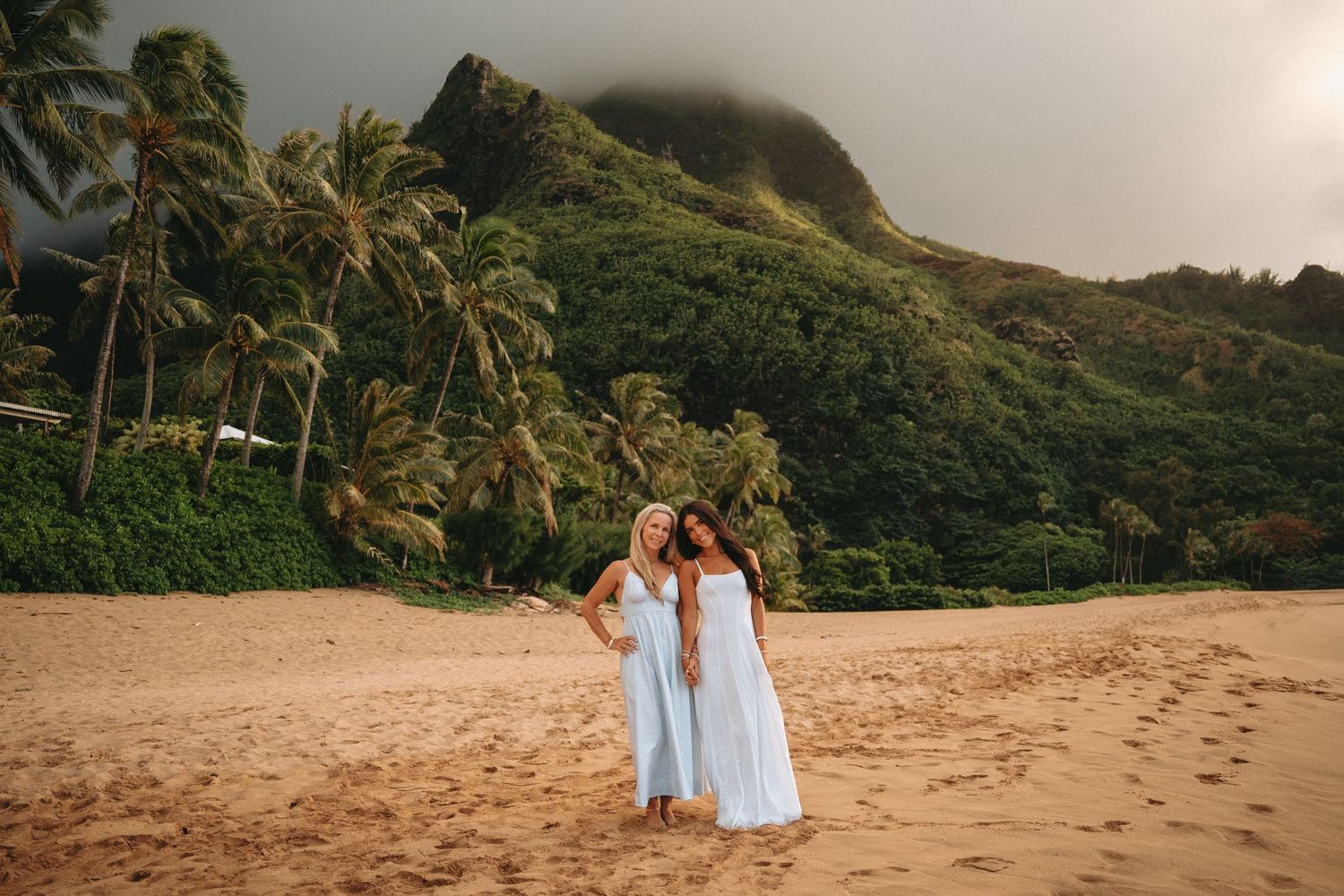 Kauai family sunset beach photos at Tunnels Beach with ocean views, golden light, and tropical Hawaii scenery.