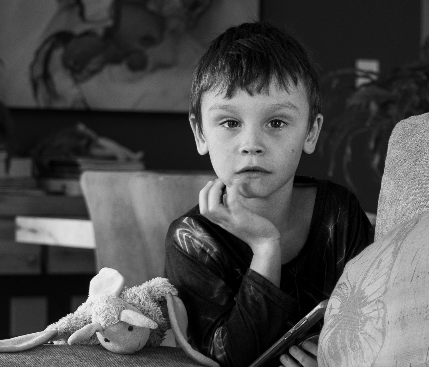 Emotional black and white documentary portrait of a child in Cape Town.