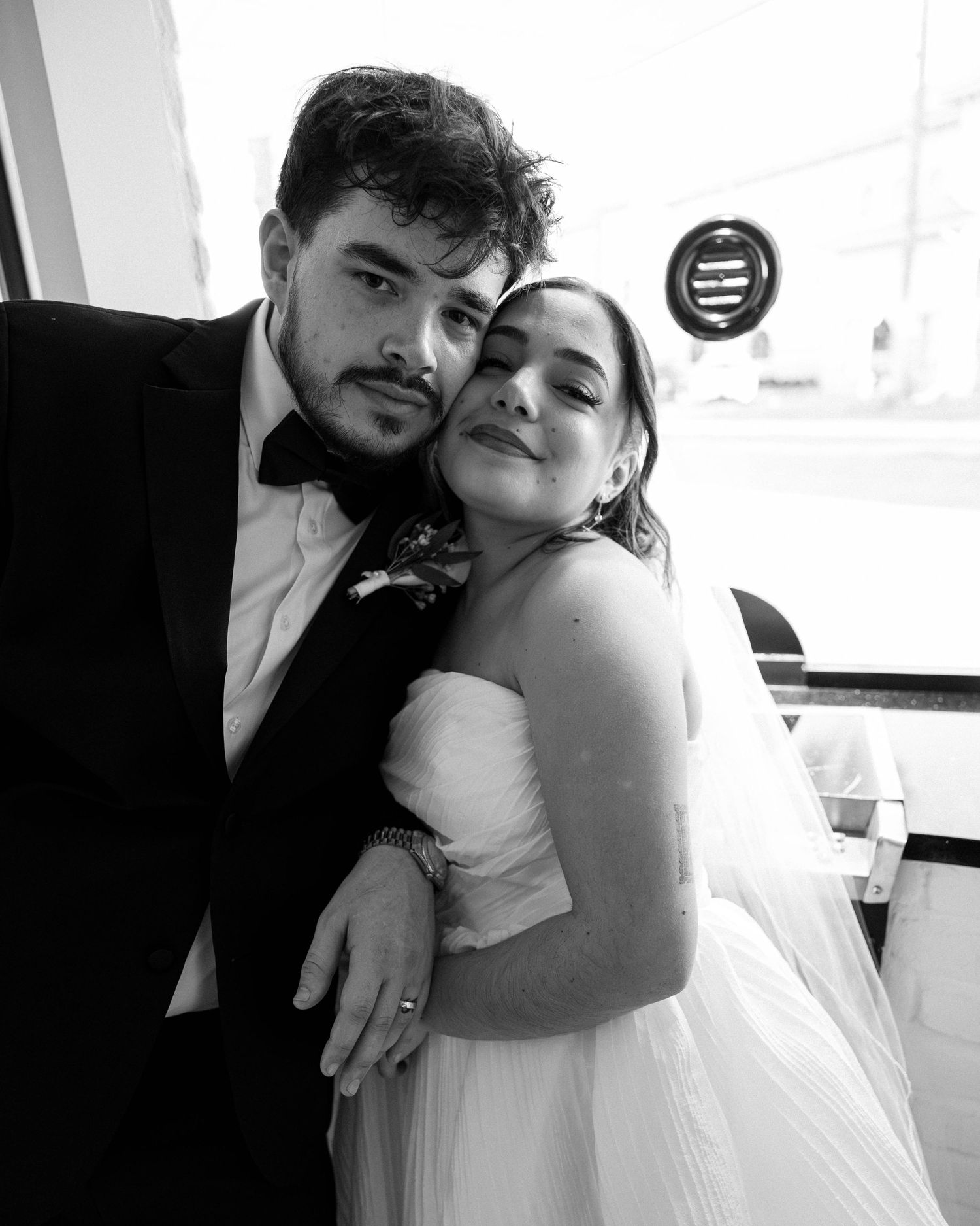 Candid wedding moments captured in black and white photography.
