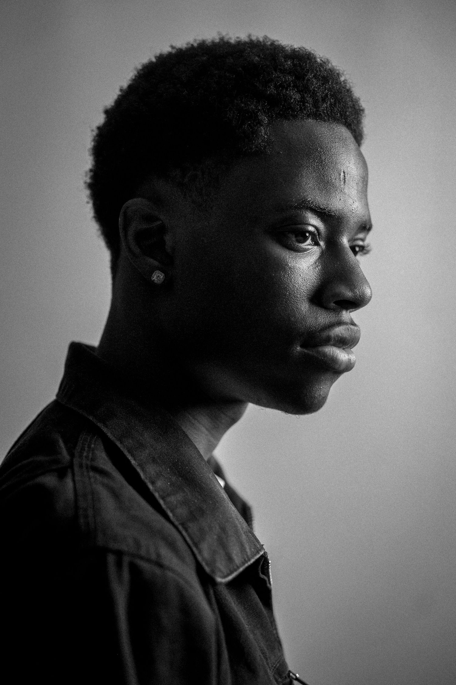 Black and white profile portraits showing range of thoughtful poses.