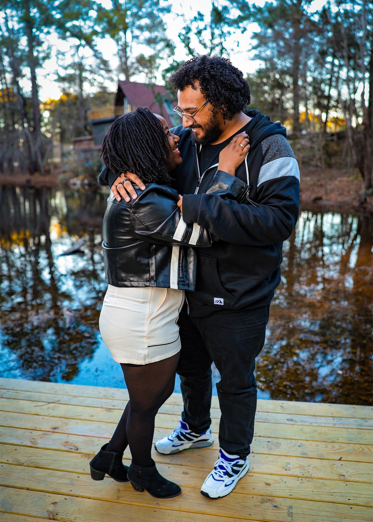 A sequence of candid interaction moments on a wooden deck by a lake.