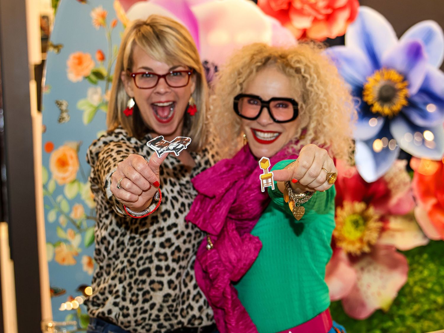 Vibrant floral backdrop with bright sunflowers and colorful blooms creates a cheerful retail display setting.