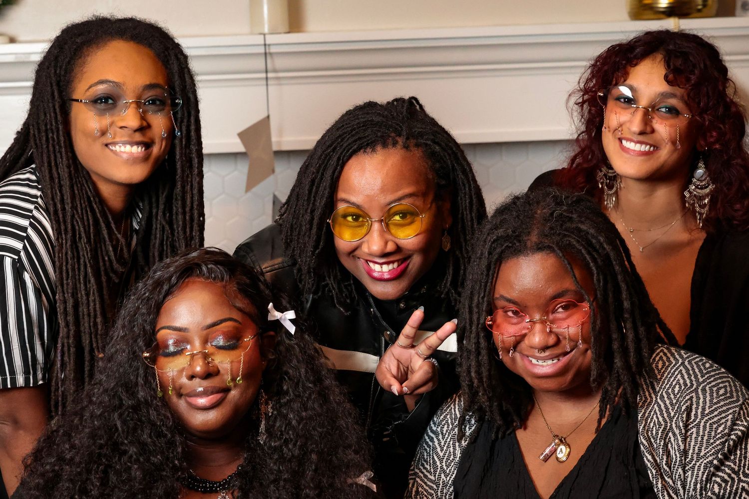 A group photo showing joyful expressions and laughter.