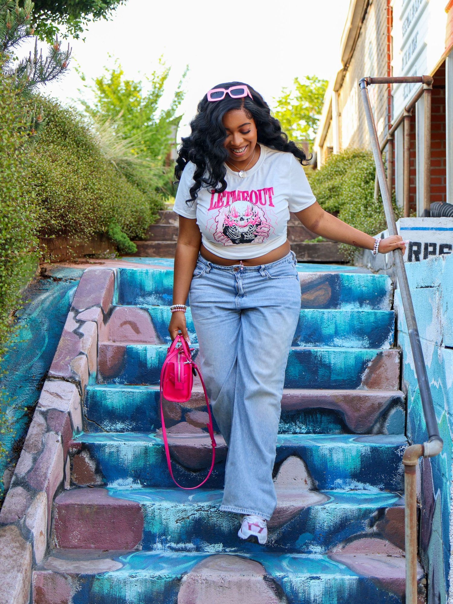 Colorful painted concrete steps with blue and purple tones in an outdoor setting.