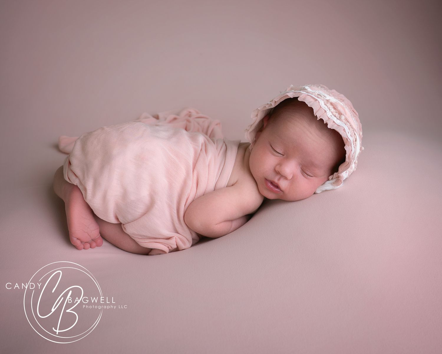 Simple posed newborn portrait by Candy Bagwell Photography, professional newborn photographer serving Fletcher, Asheville, and Western NC.