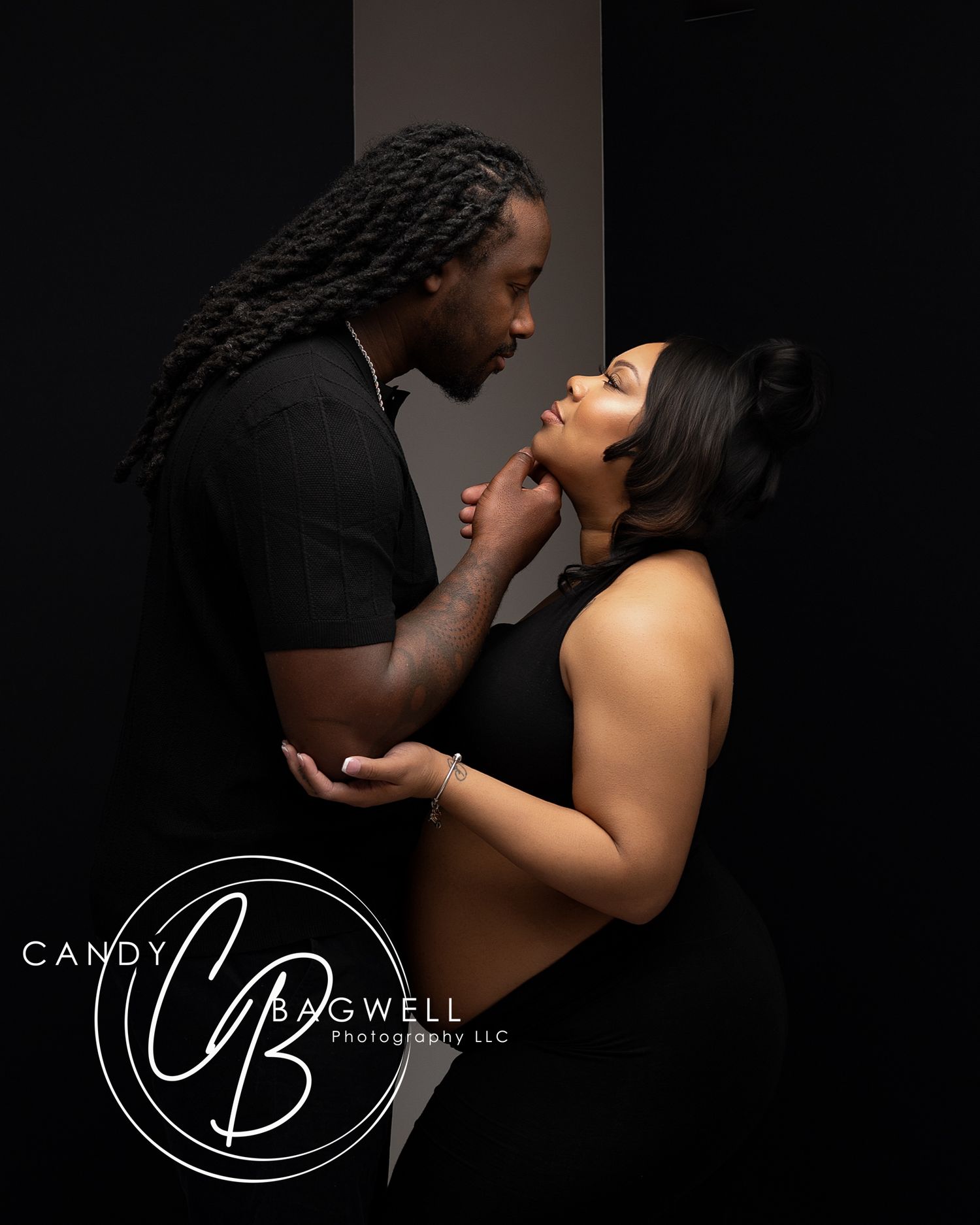 Intimate couples studio portrait with dramatic lighting and guided posing by Candy Bagwell Photography in Fletcher, NC.