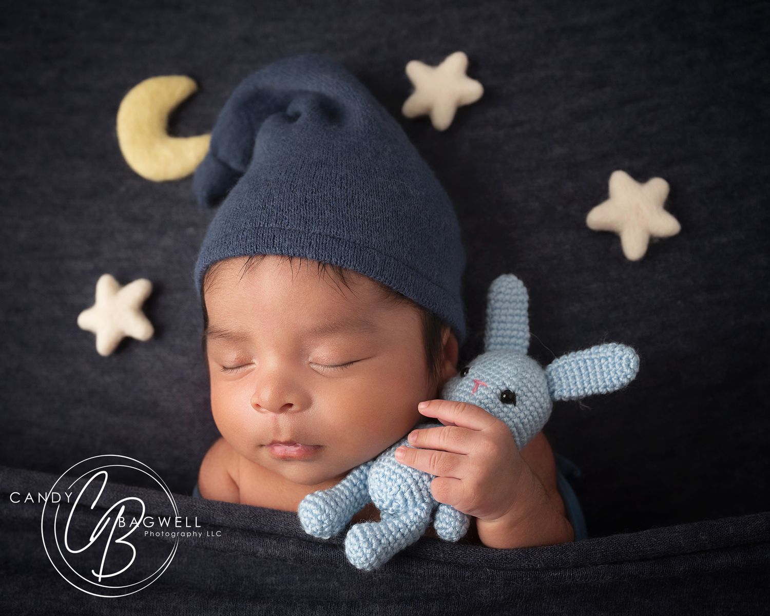 Simple posed newborn portrait by Candy Bagwell Photography, professional newborn photographer serving Fletcher, Asheville, and Western NC.