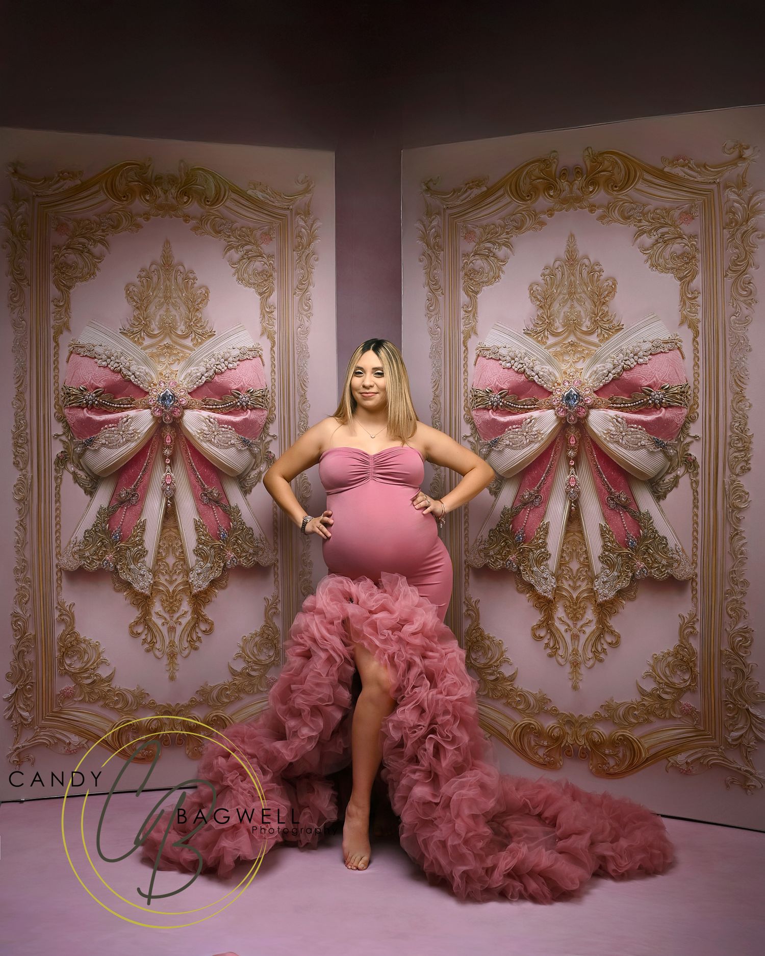 Luxury maternity portrait featuring an expecting mother in a dramatic pink gown and elegant styling by Candy Bagwell Photography in Fletcher