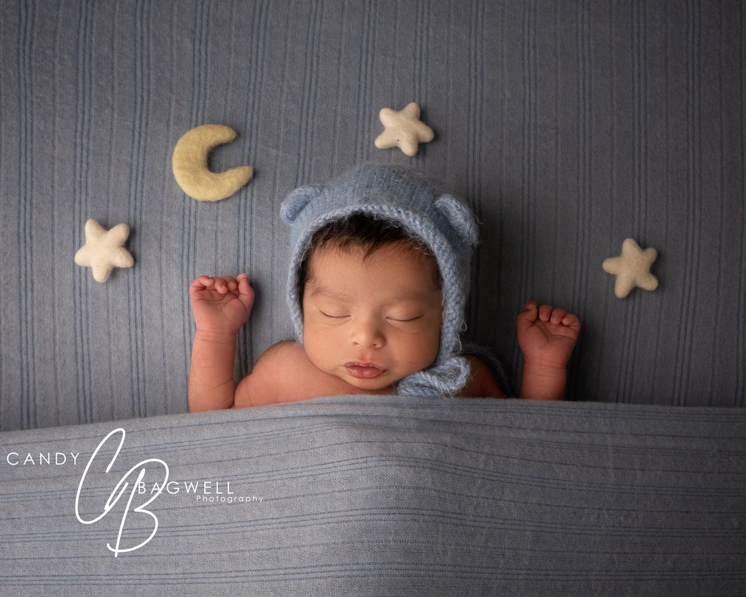 Sweet newborn portrait of a sleeping baby with moon and star details by Candy Bagwell Photography, newborn photographer in Fletcher, NC.