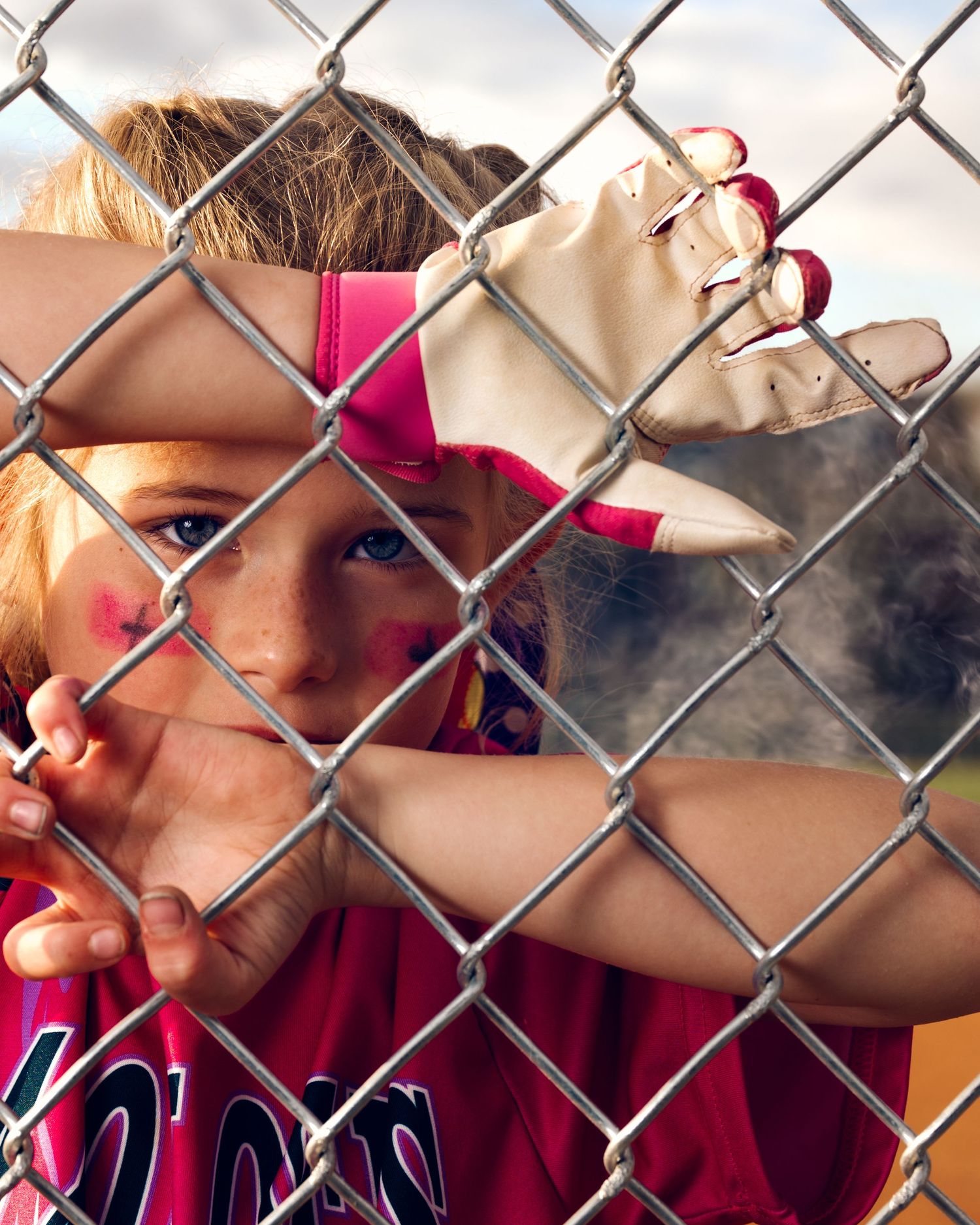 Creative sports portrait of a young softball player by Candy Bagwell Photography, serving Fletcher, Asheville, and Western NC.