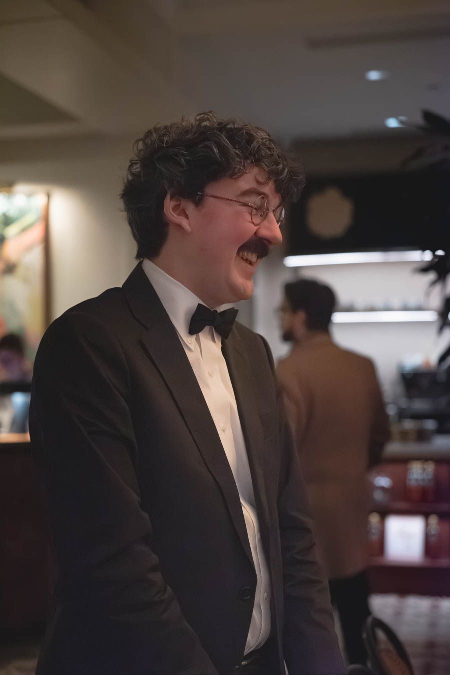 Groom laughing