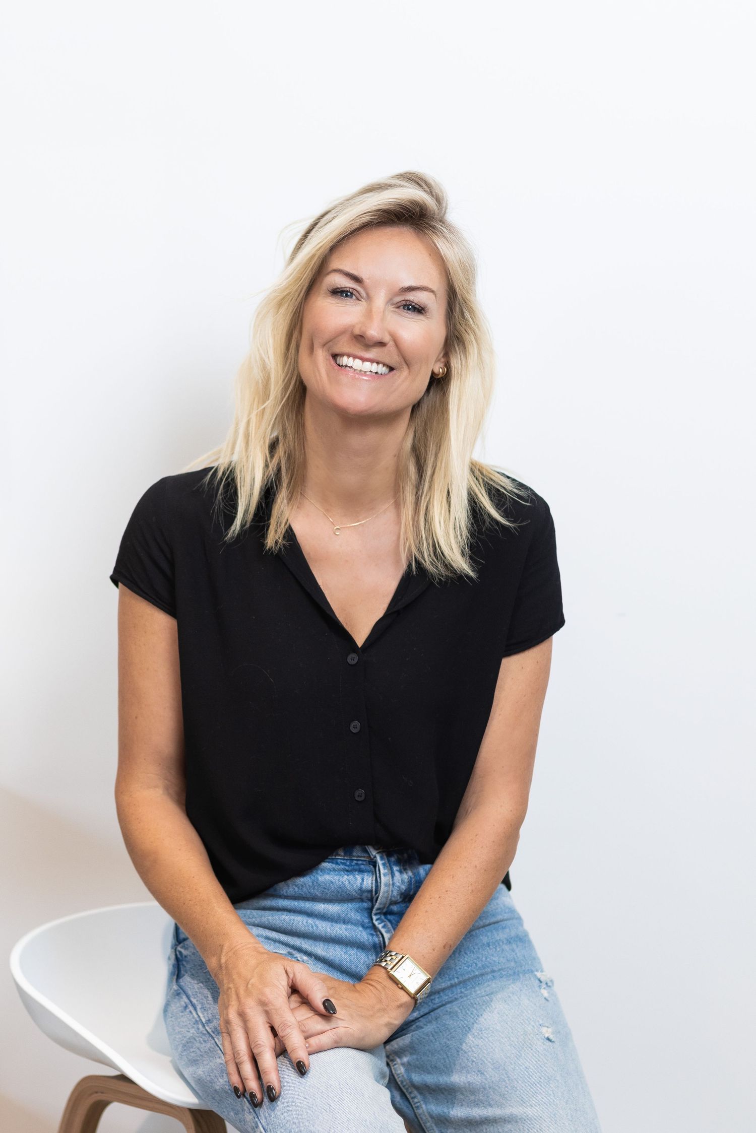Casual studio portraits on white background showing relaxed poses and expressions. Captured for Pebble Interiors.