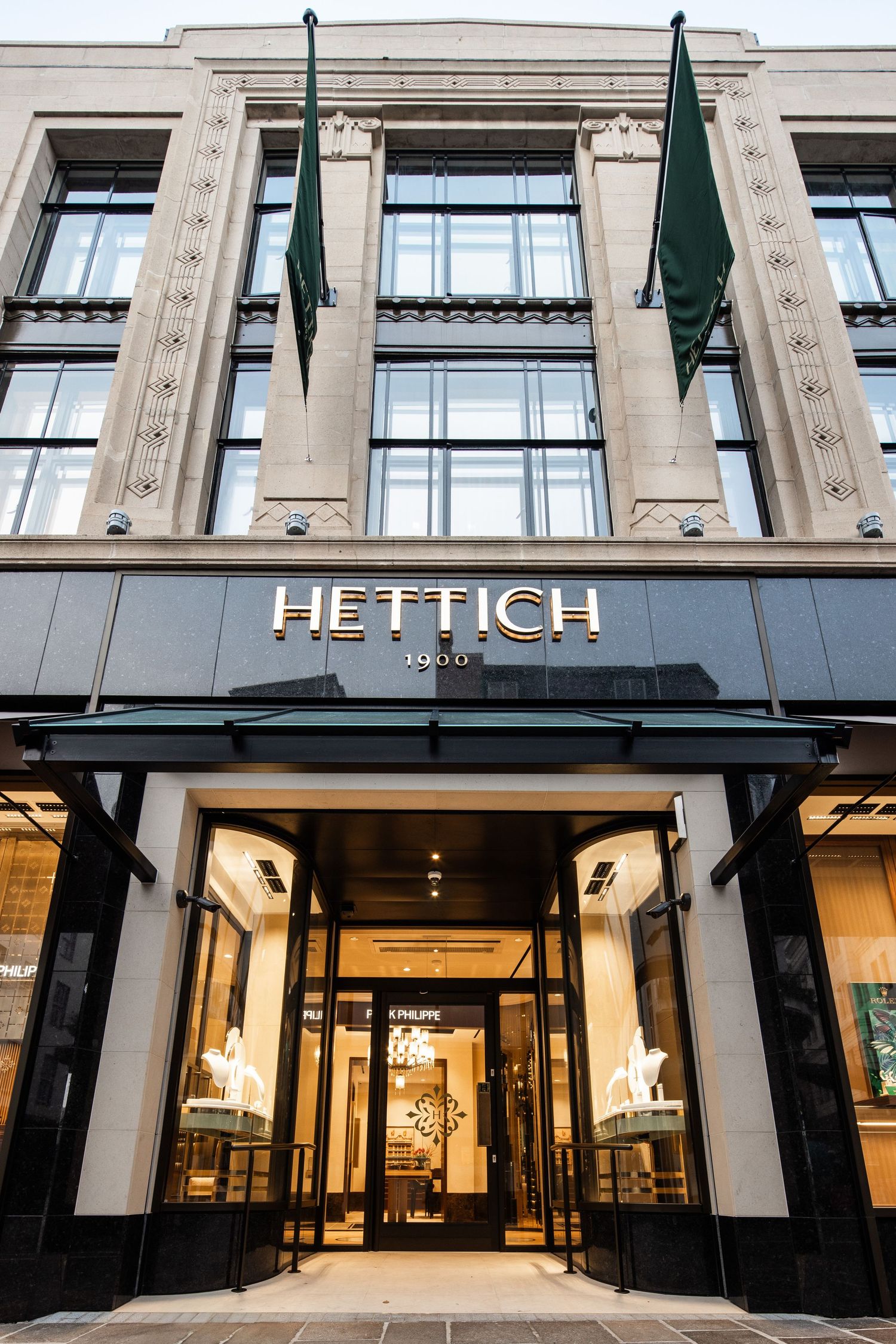 Exterior view of the Hettich storefront with classic architectural details and modern signage.