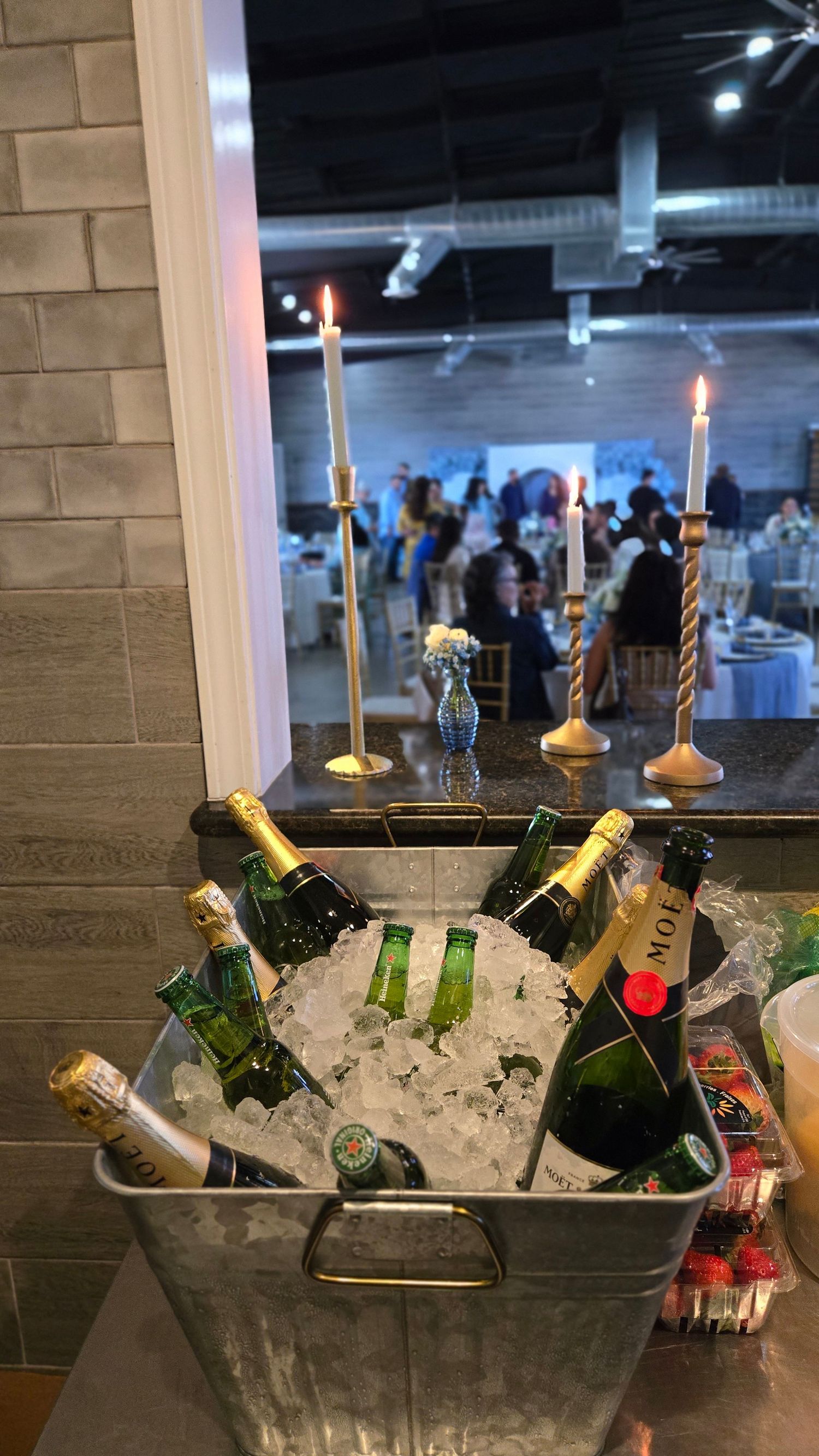 champagne bottles and beer on ice for event bar service