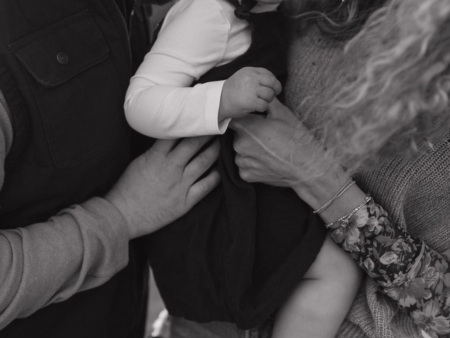 Intimate black and white close-up shot showing gentle embrace. Alabama photographer; South Alabama photographer