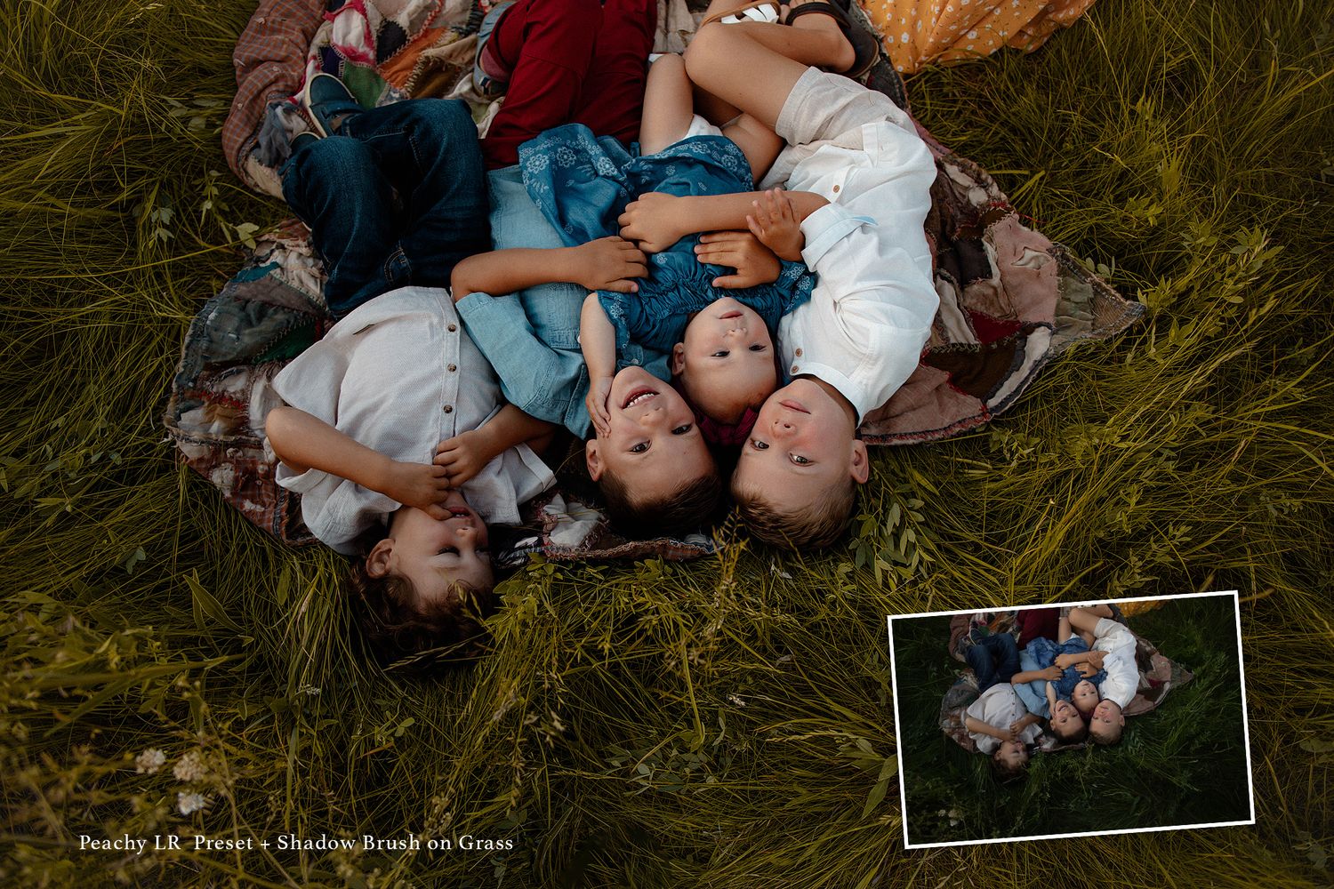Family lying together in tall grass during a rustic outdoor photo session.