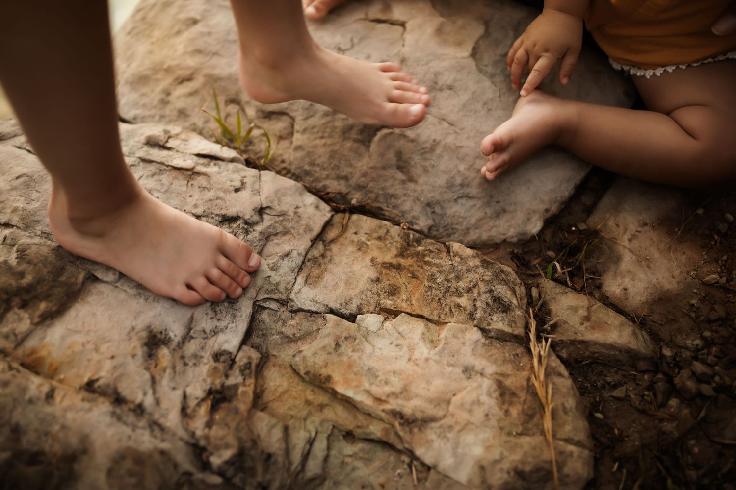 Bare feet walking on textured stone surfaces in a sequential photo series.