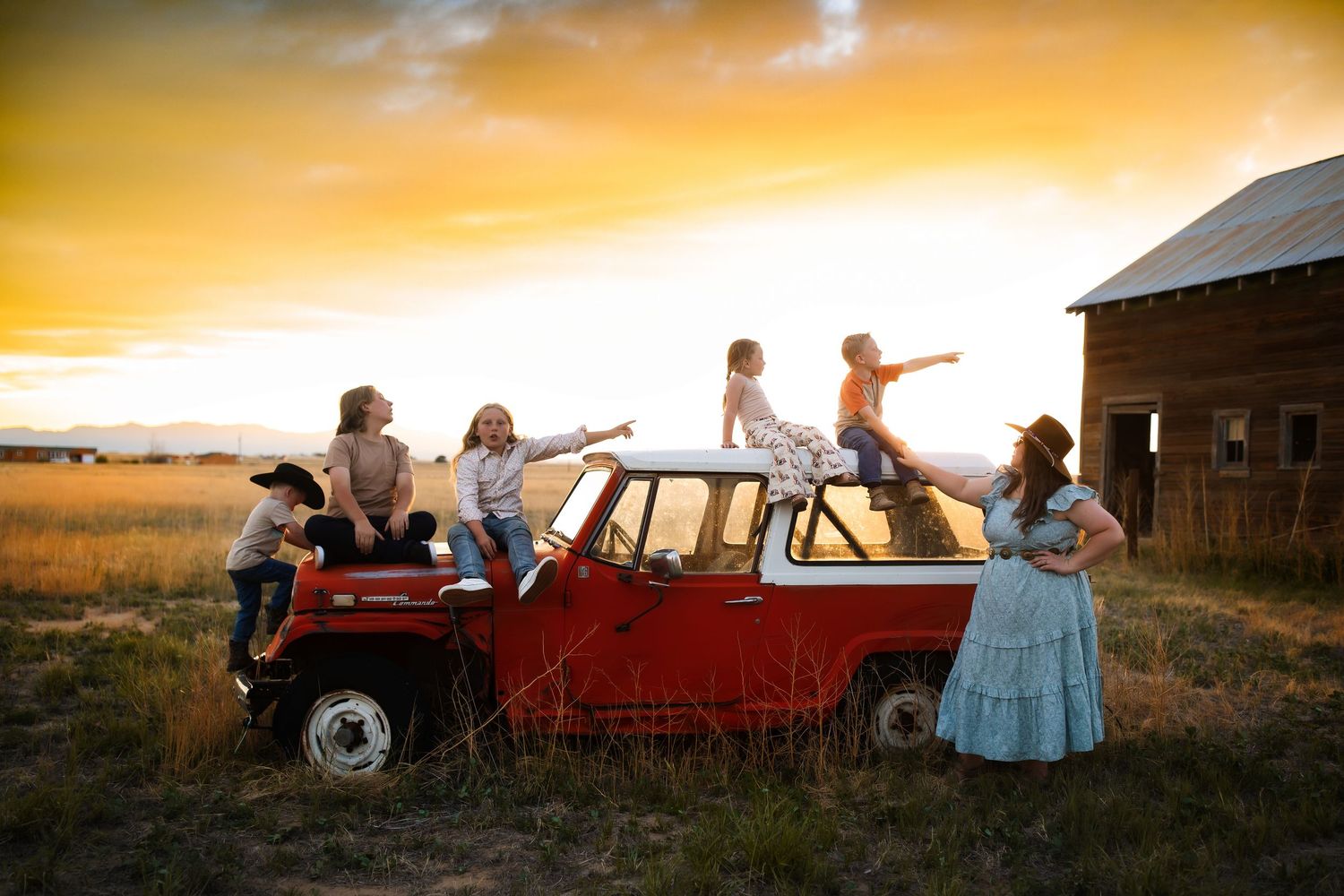 A series of sunset silhouettes showing people gathered around vintage cars in rural countryside settings at golden hour.