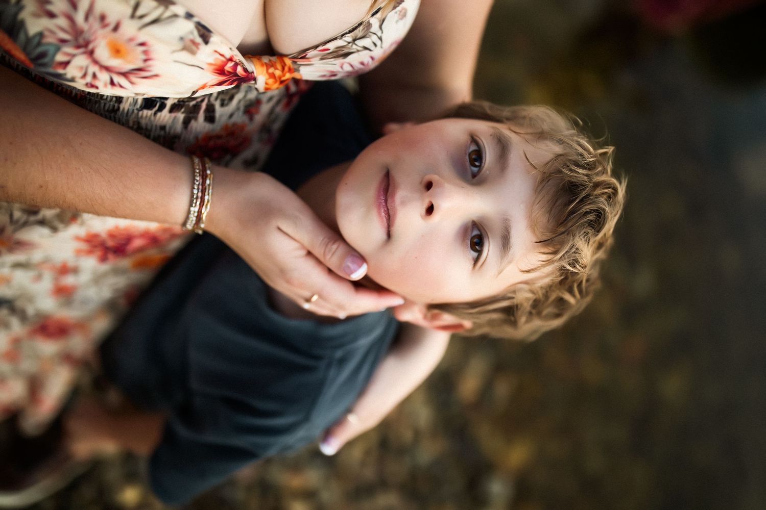 A series of portrait photos showing someone with blonde hair in natural lighting against a dark background.