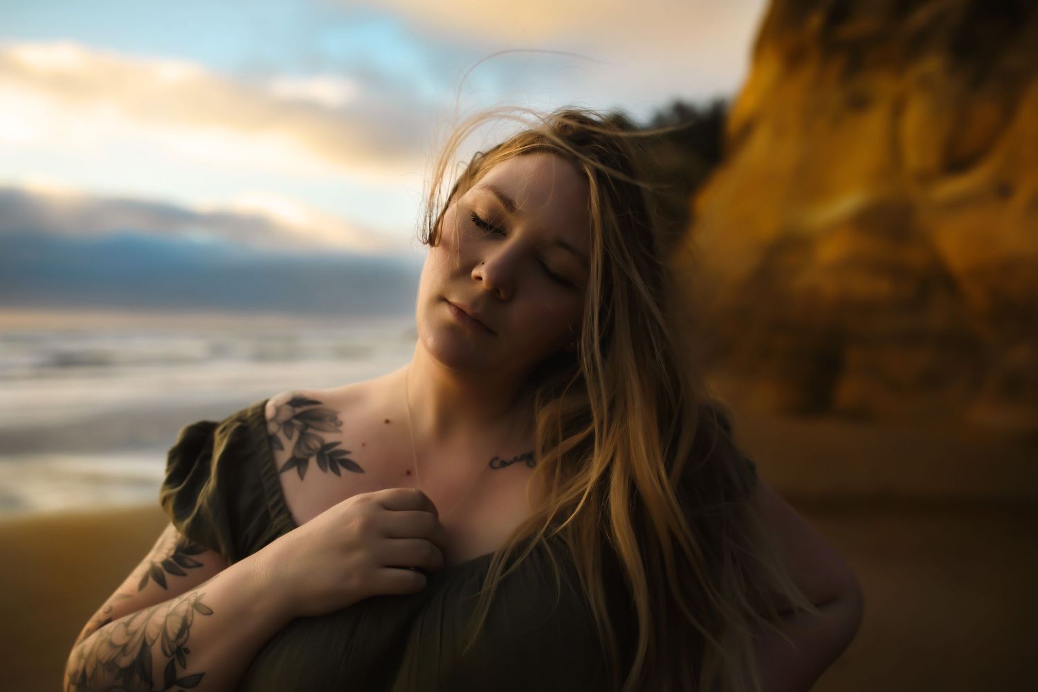 Ethereal golden light illuminates figures resting in a natural outdoor setting.