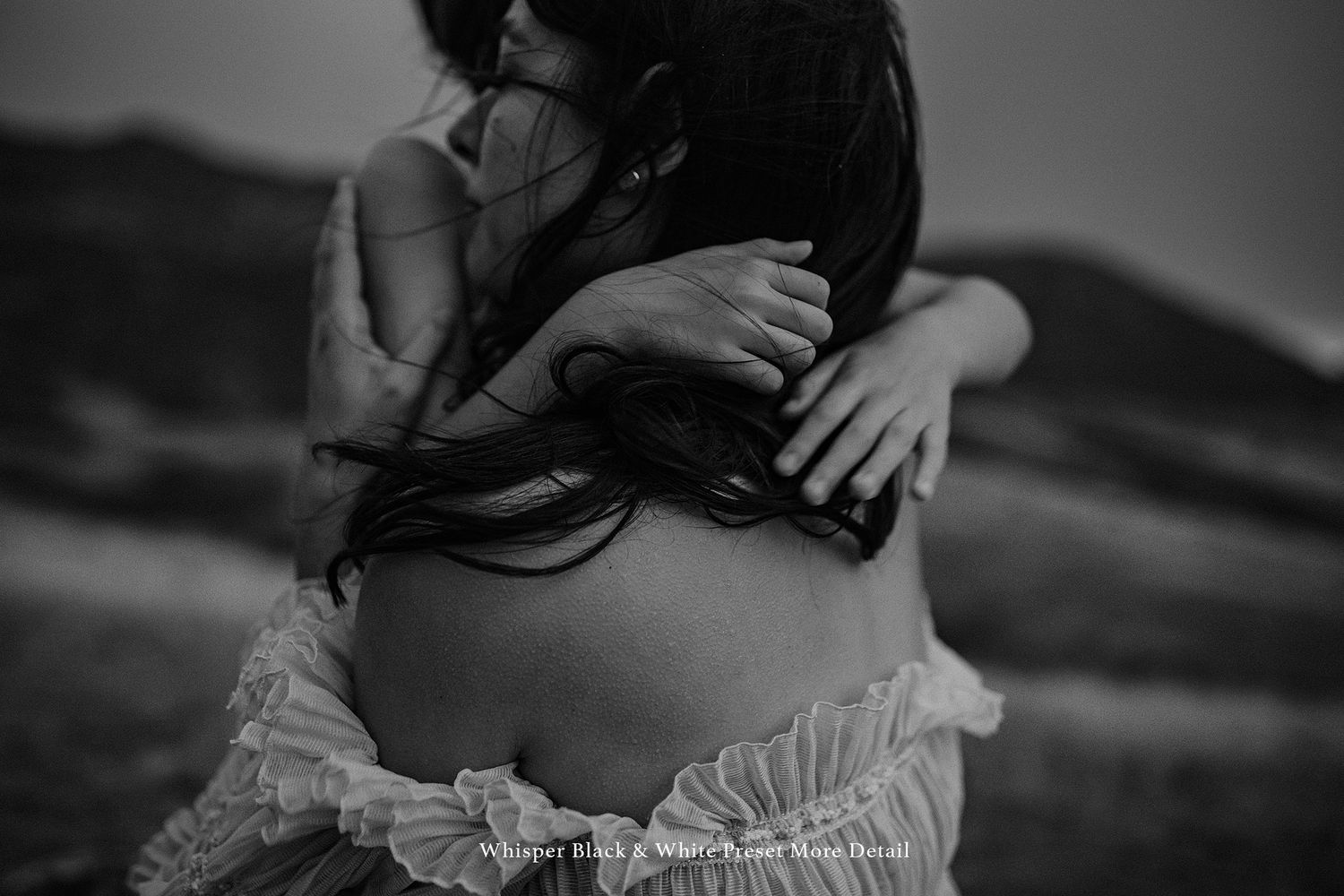 Black and white intimate portraits showing tender family moments.