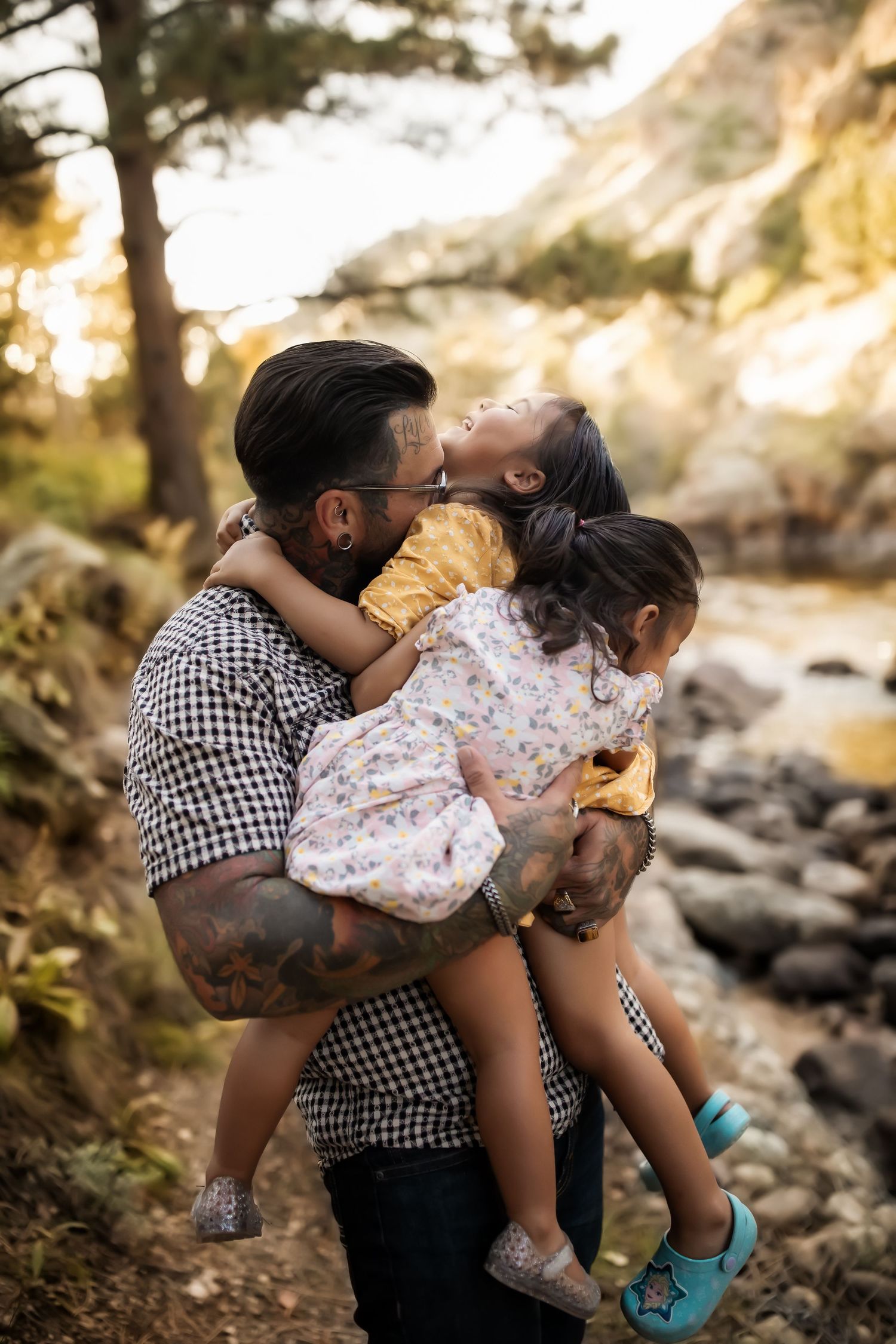 Playful outdoor moments captured on rocky terrain during sunset.
