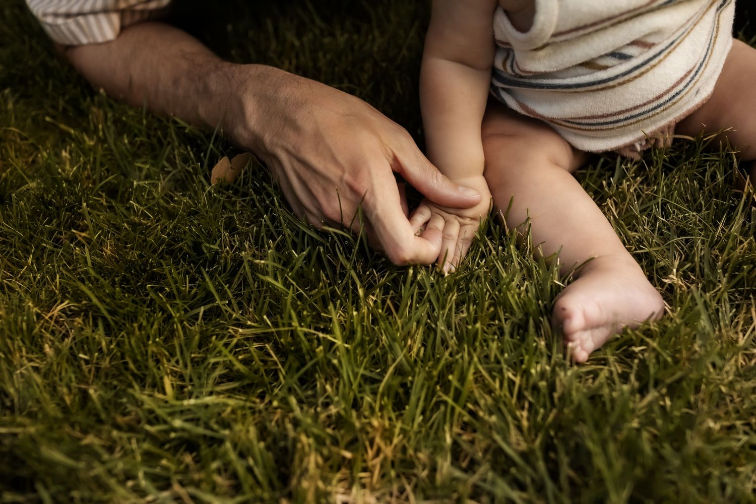 Multiple shots of bare feet resting on green grass in a garden setting.