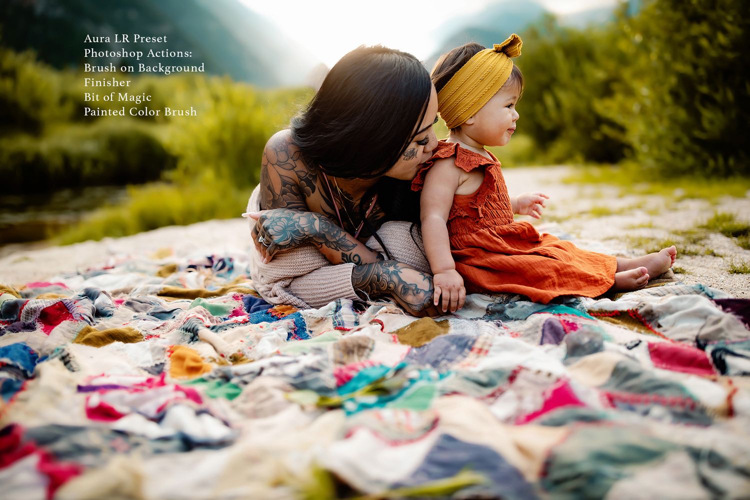 Artistic photography session with scattered colorful items on a light colored blanket outdoors.