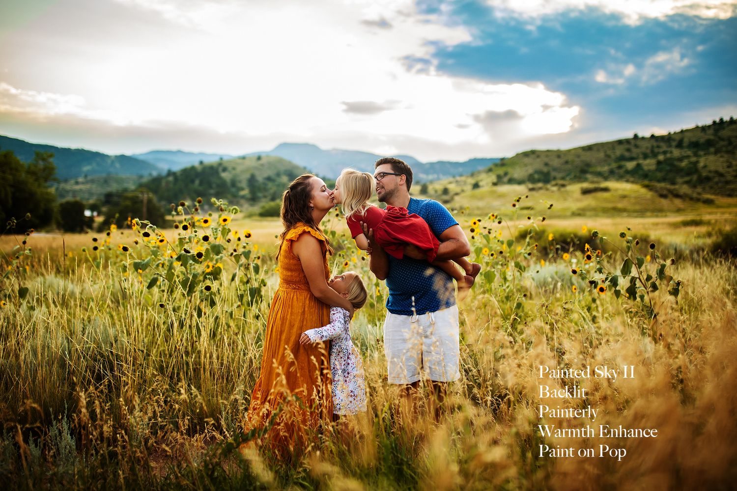 Romantic picnic scene in a mountain meadow at sunset with golden light and dramatic clouds.