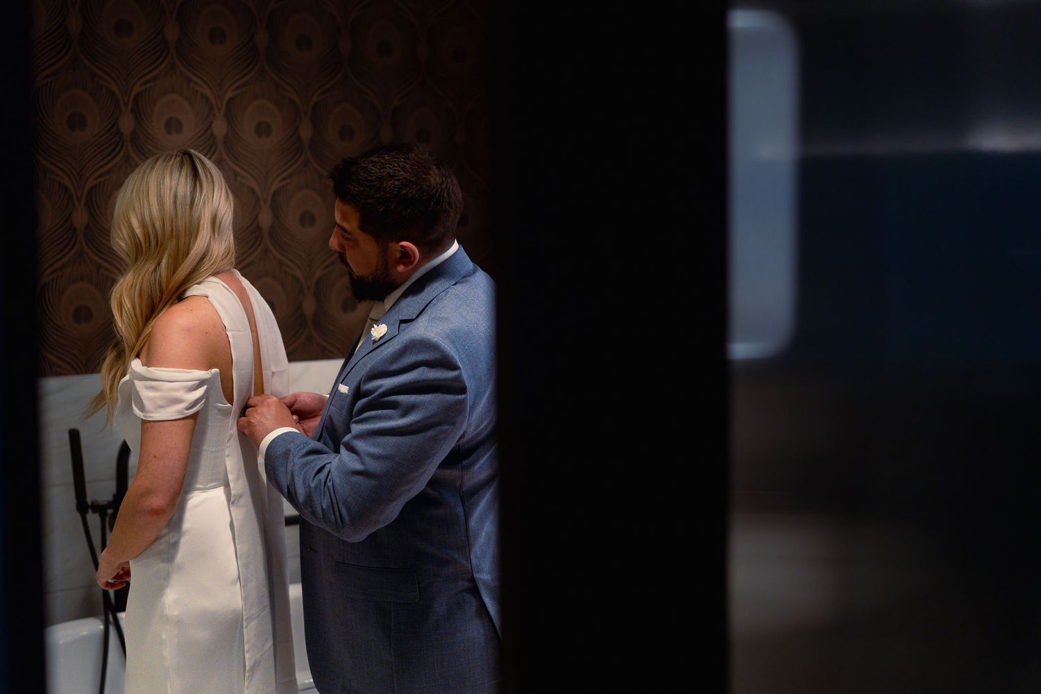 Romantic dance sequence captured in dark moody lighting during wedding preperation